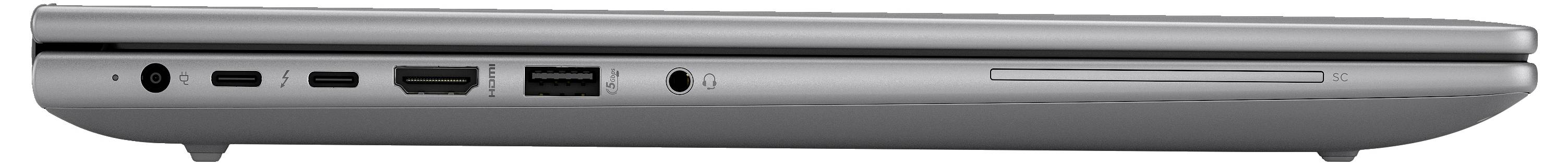 Seitenansicht eines Laptops mit mehreren Anschlüssen, darunter USB, HDMI und Kopfhöreranschluss, auf einer flachen Oberfläche.