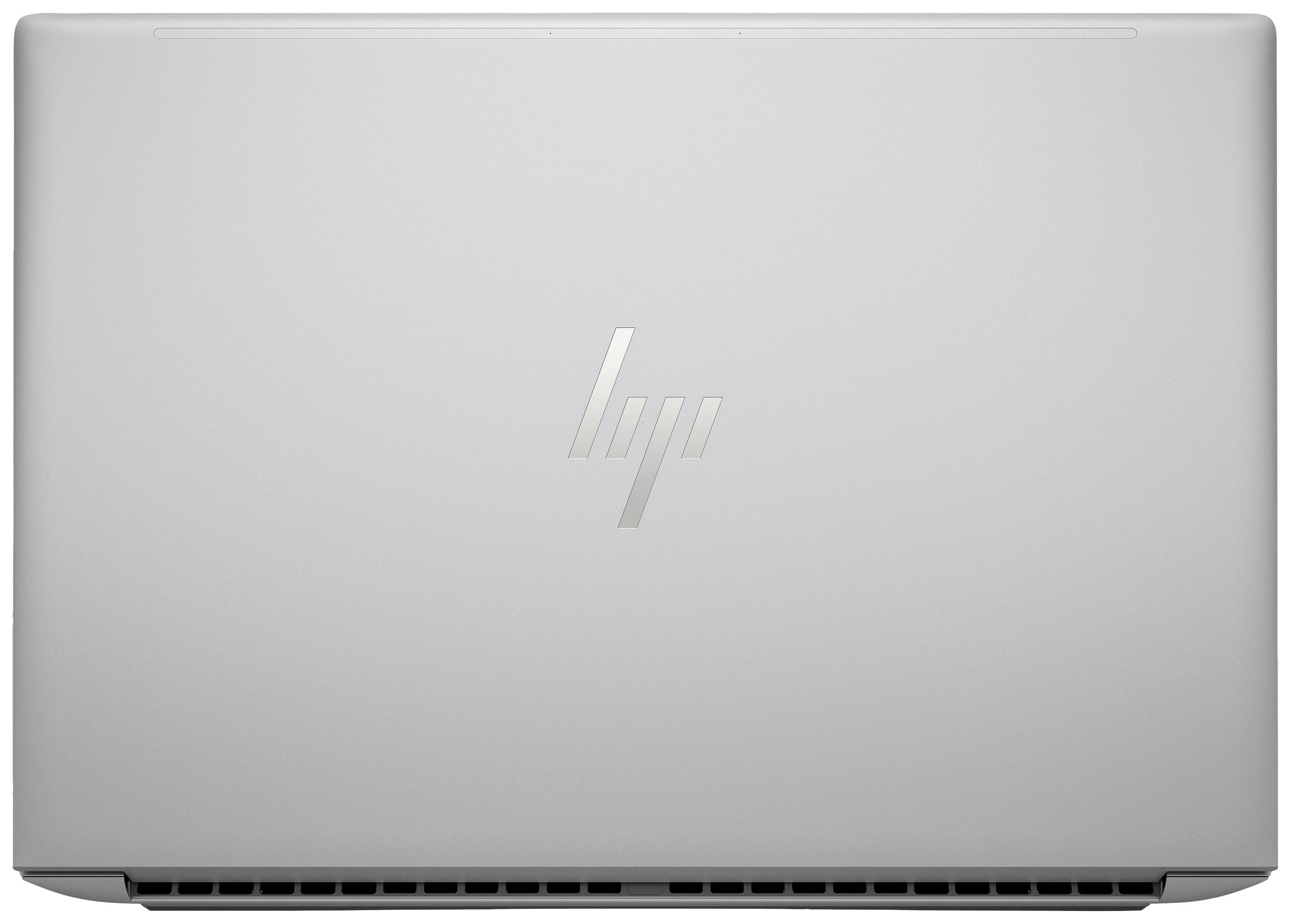 Silberner Laptopdeckel mit einem glänzenden Logo in der Mitte.