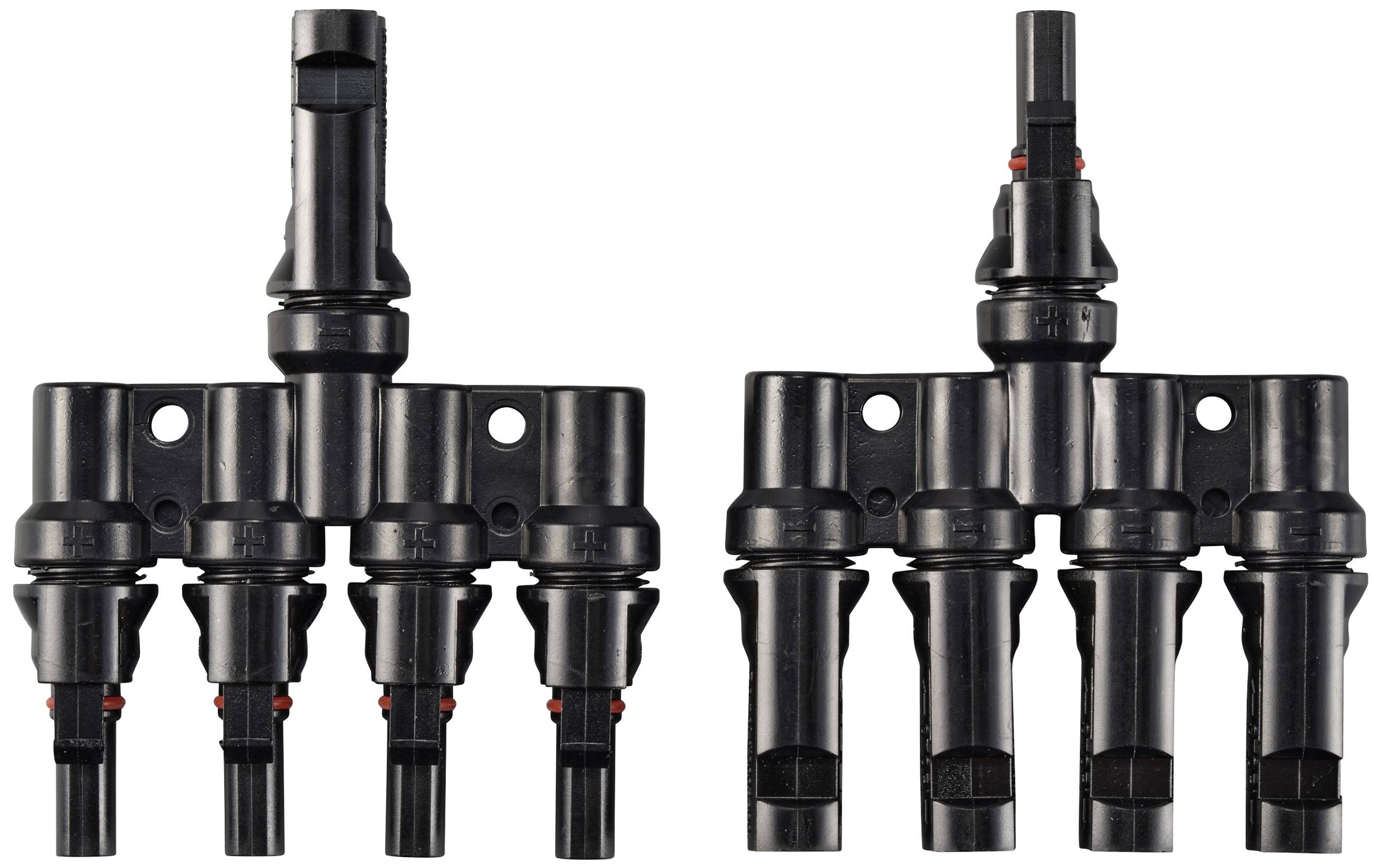 Zwei schwarze Kunststoff-Verteiler mit mehreren Anschlüssen, nebeneinander angeordnet. Sie dienen der elektrischen Verbindung.