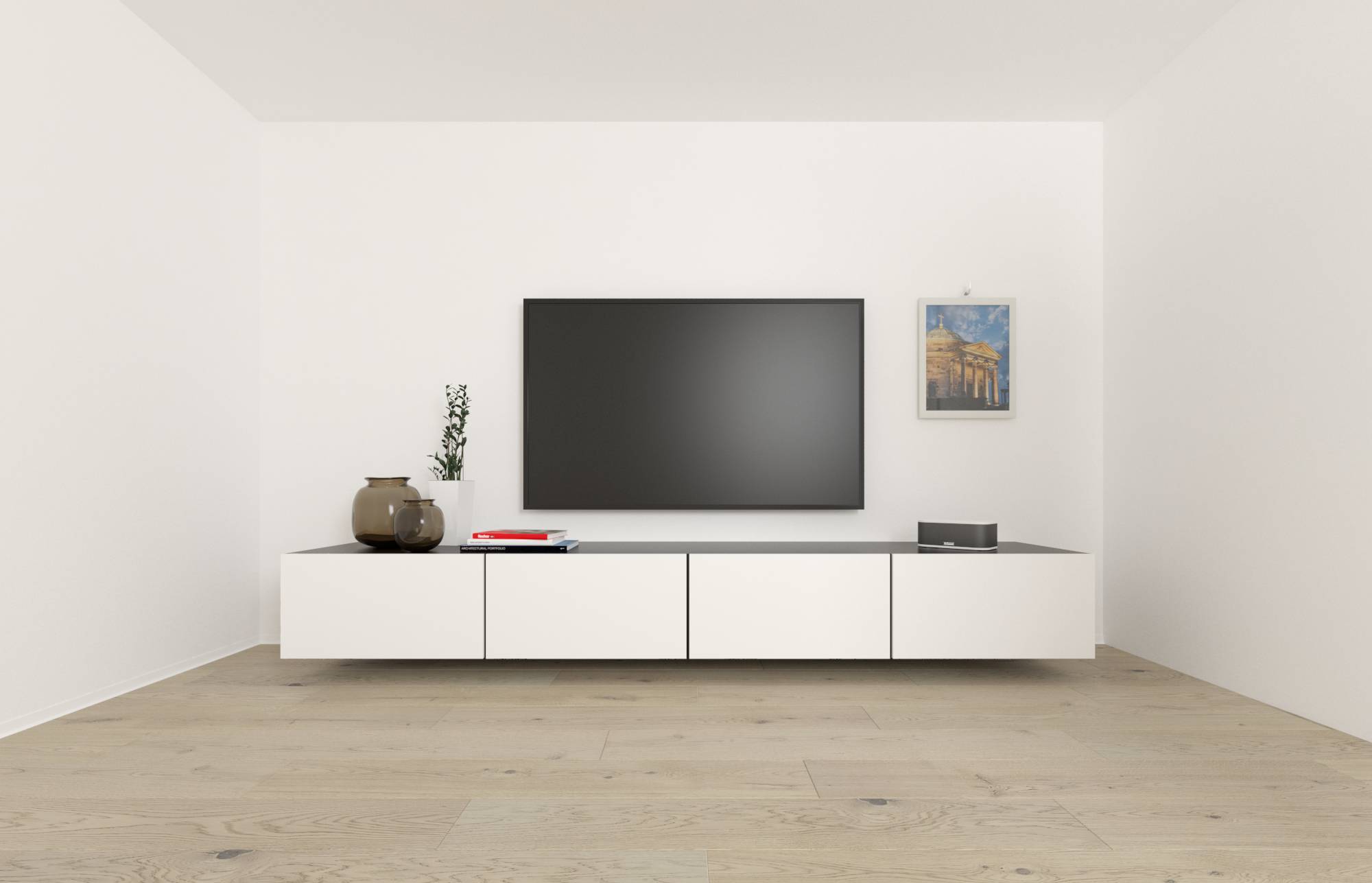 Modernes minimalistisches Wohnzimmer mit einem wandmontierten Fernseher über einem niedrigen weißen Sideboard, einer kleinen Vase und Büchern auf der linken Seite und einem gerahmten Bild auf der rechten Seite.