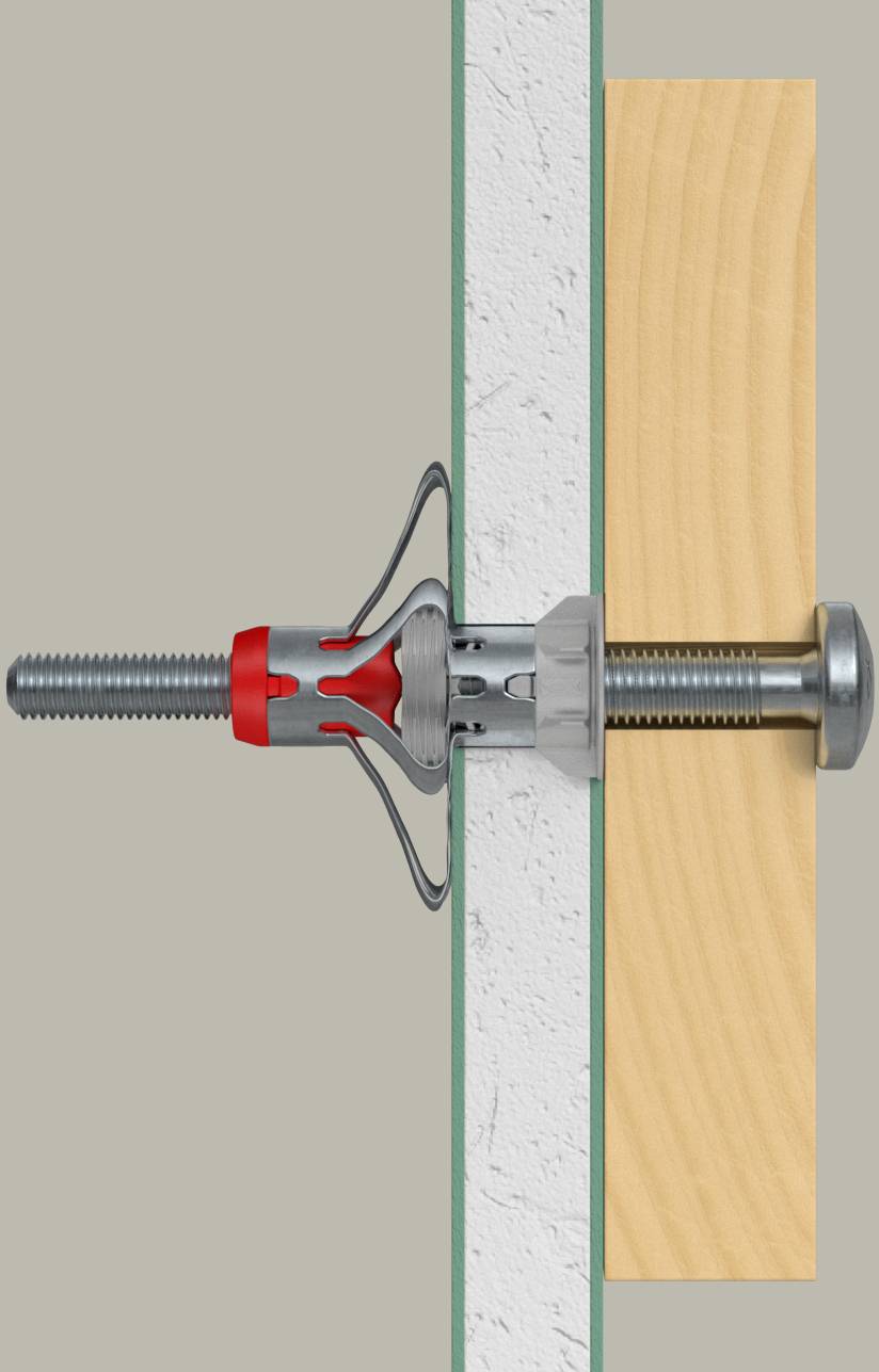 Schnittdiagramm eines Wanddübels, der in Gipskarton eingeführt wird und eine Schraube an einem Holzbrett befestigt. Der Dübel dehnt sich hinter dem Gipskarton aus, um Stabilität zu gewährleisten.