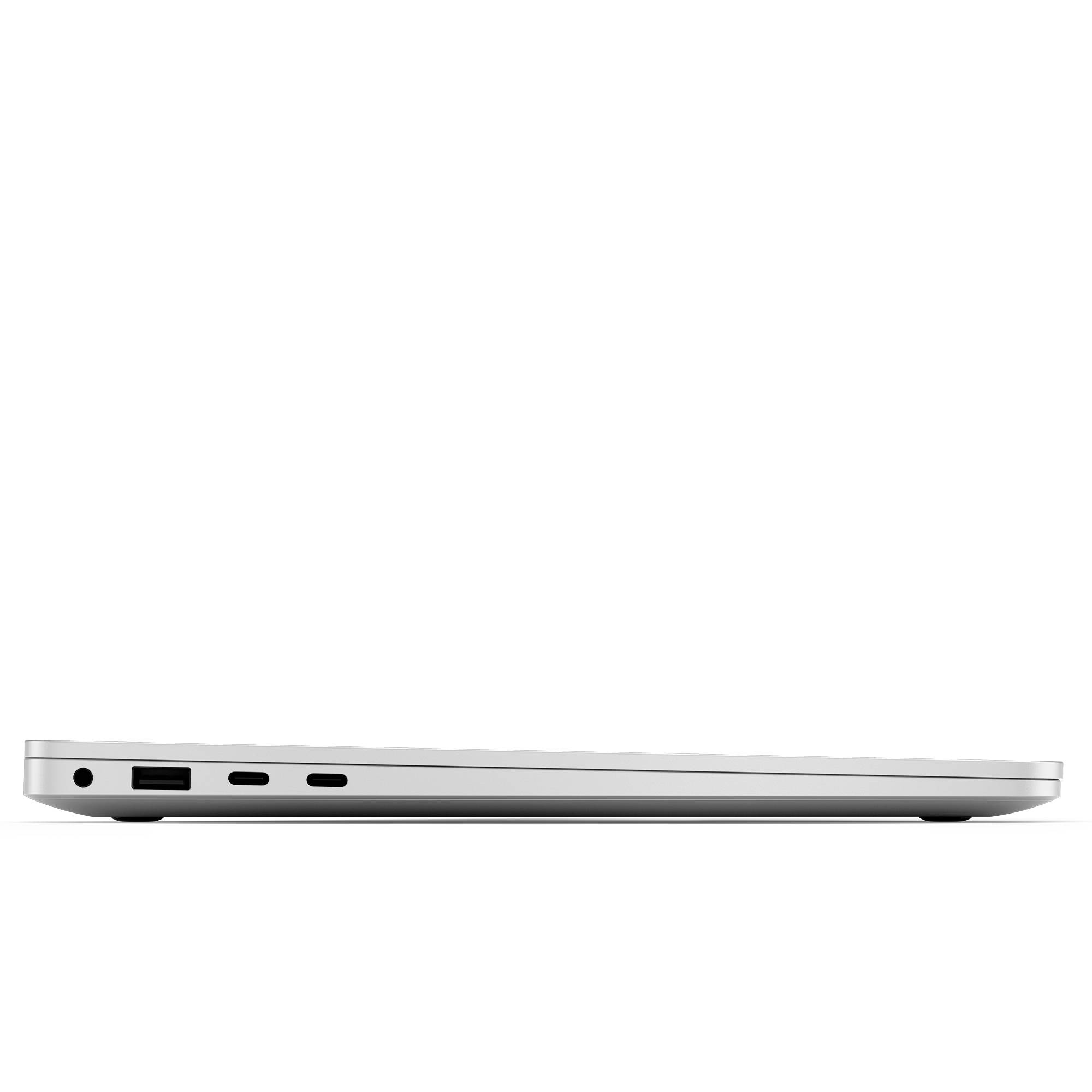 Dünner Laptop in geschlossenem Zustand, seitlich gesehen, zeigt Anschlüsse und modernes, schlankes Design.