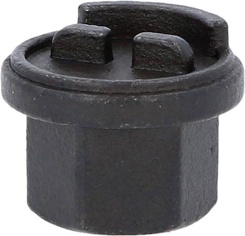 Schwarzer Zylinder mit zwei horizontalen Griffen auf der Oberseite, wirkt fest und mechanisch.