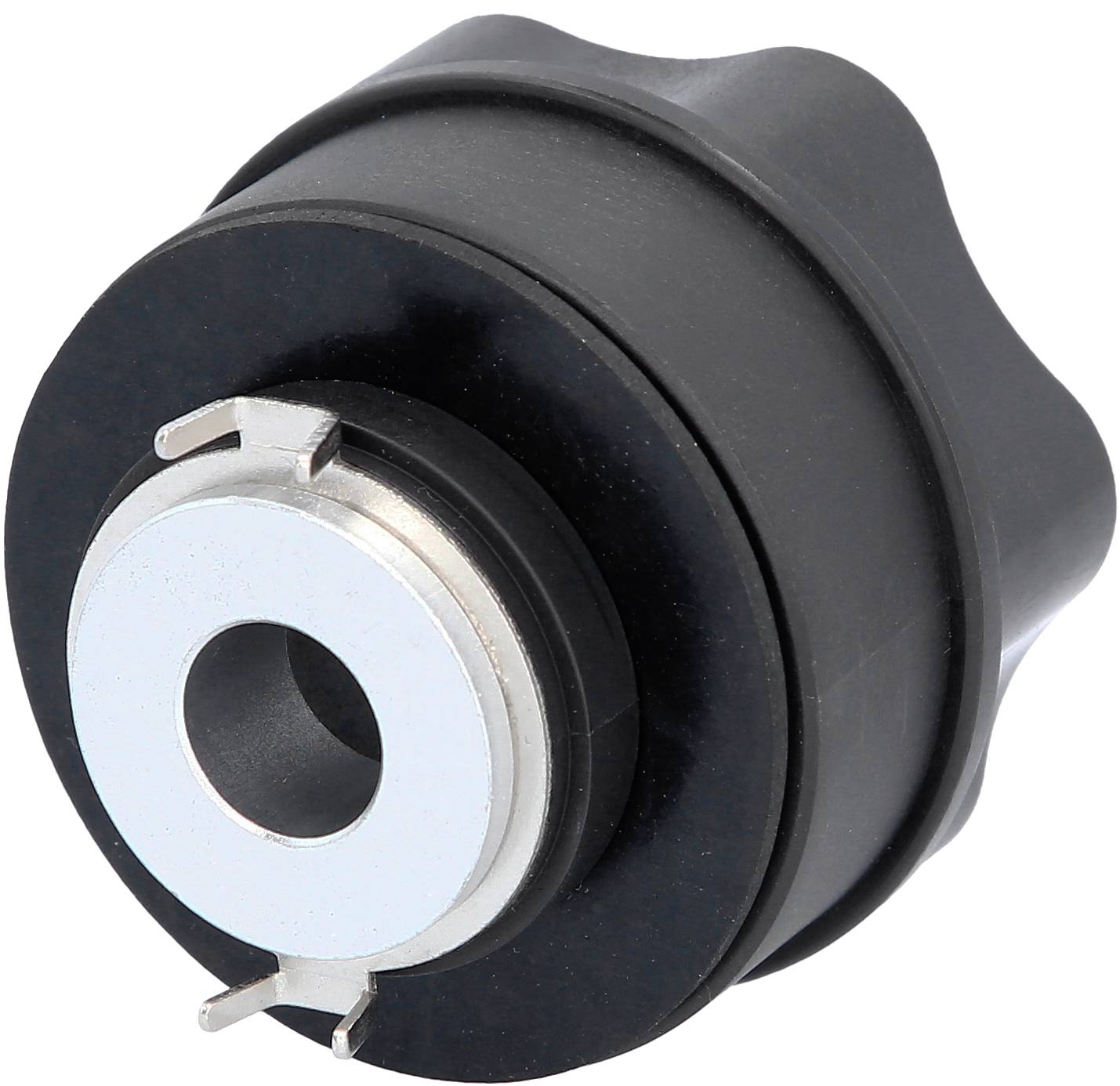 Schwarzes, rundes Kunststoffteil mit silbernem Metallring und zentralem Loch, vermutlich ein mechanisches Bauteil oder Verbindungselement.