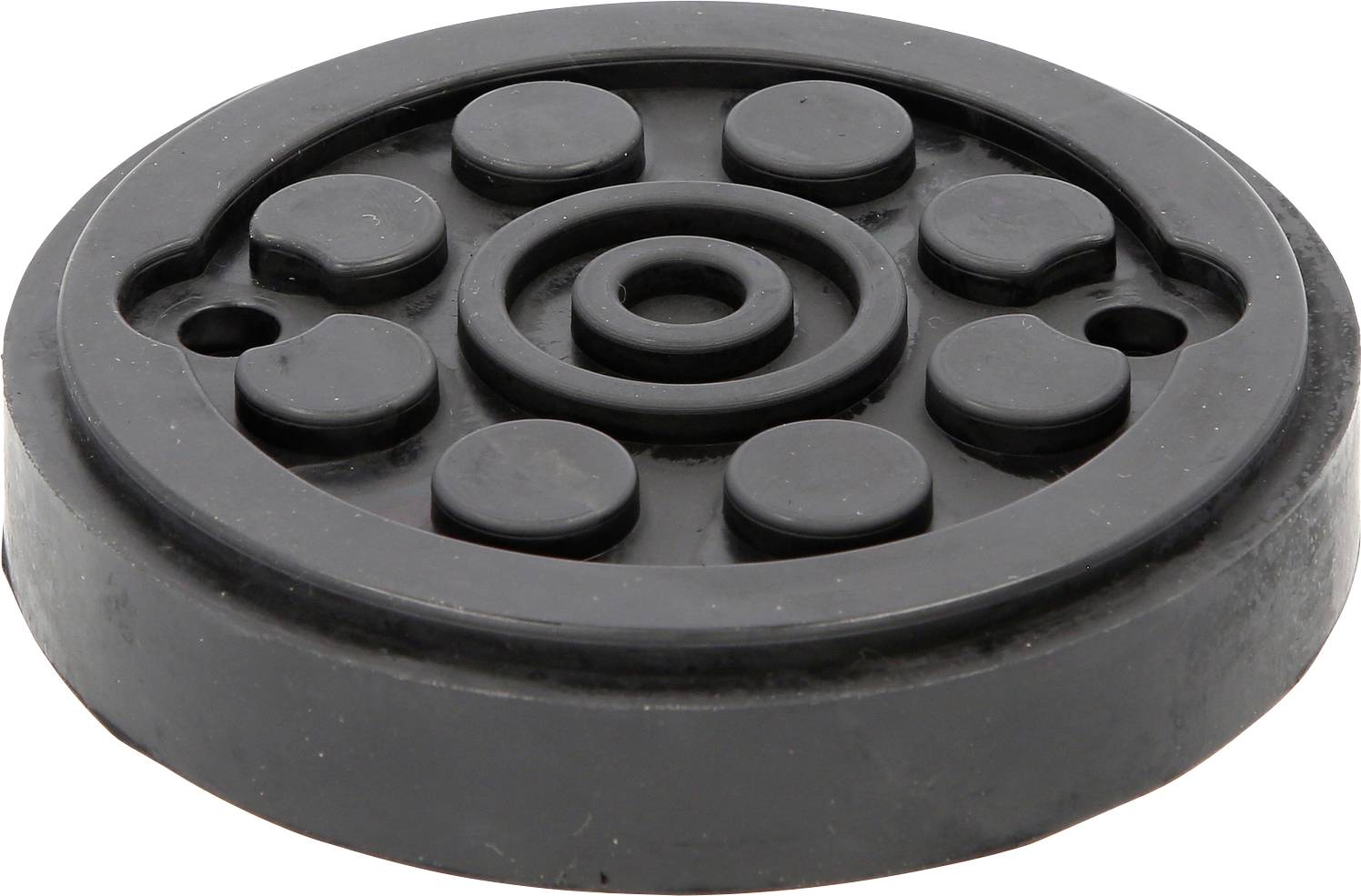 Runde schwarze Gummiunterlage mit mehreren runden Erhebungen und einer zentralen Vertiefung, möglicherweise zur Vibrationsdämpfung.