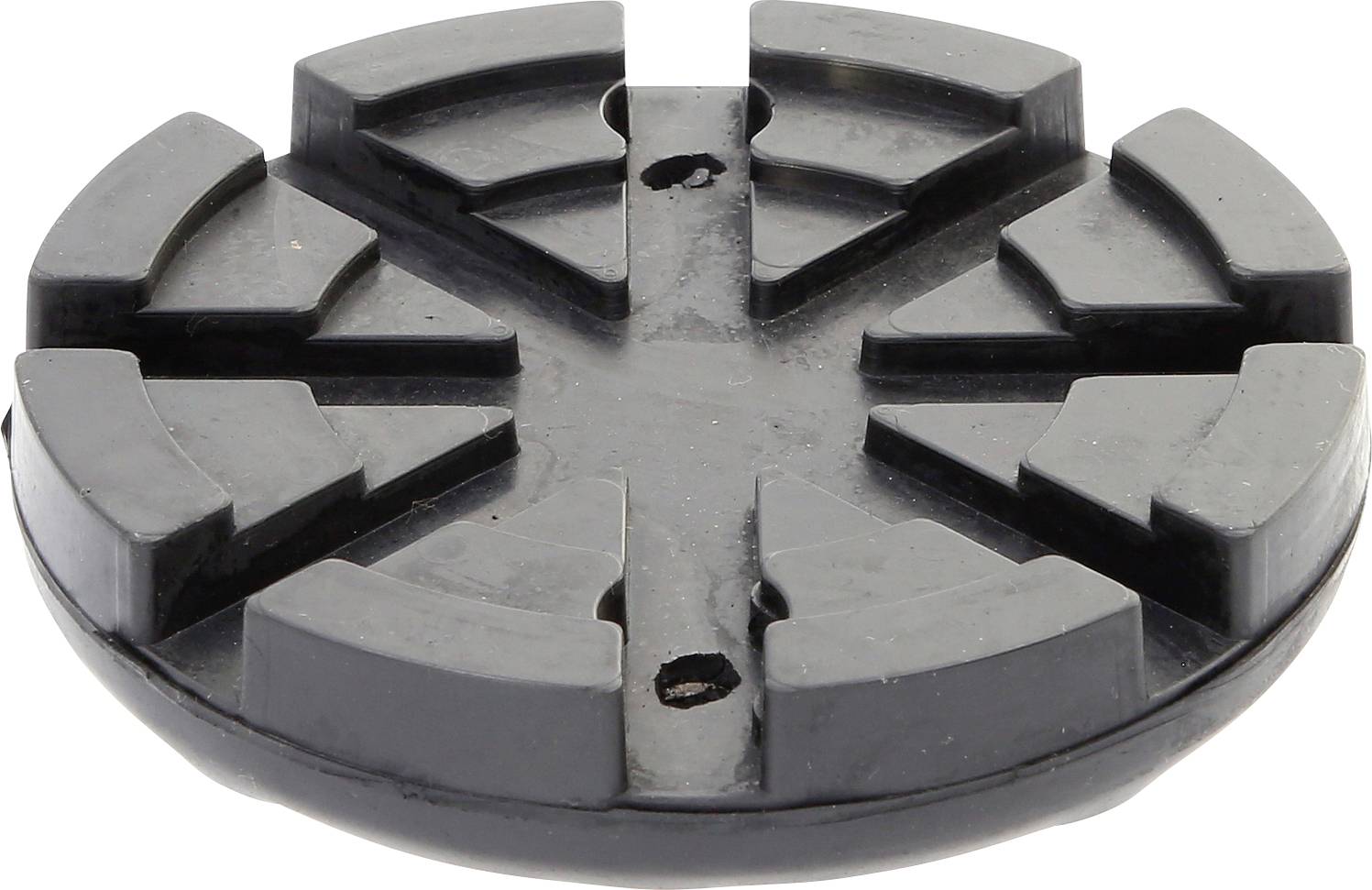 Rundes Gummipolster mit Rillen, eventuell als Schutz- oder Dämpfungselement für Maschinen oder Fahrzeuge.