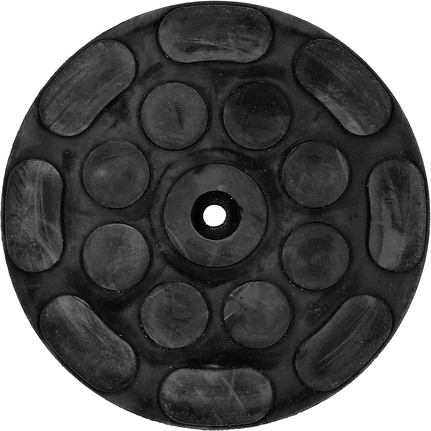 Schwarze runde Gummischeibe mit mehreren erhabenen ovalen und runden Flächen, zentralem Loch in der Mitte.