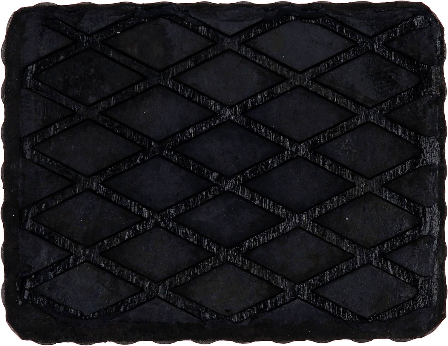 Eine einzelne schwarze, rechteckige Gummimatte mit rautenförmigem Muster.