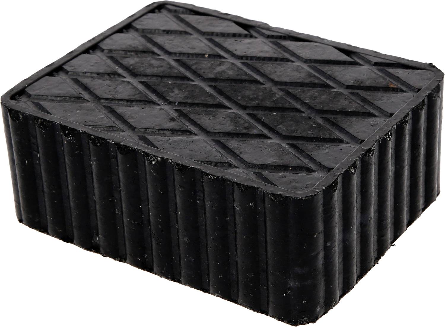 Ein rechteckiger, schwarzer Gummi-Block mit seitlichen Rillen und diagonalen Mustern auf der Oberfläche.