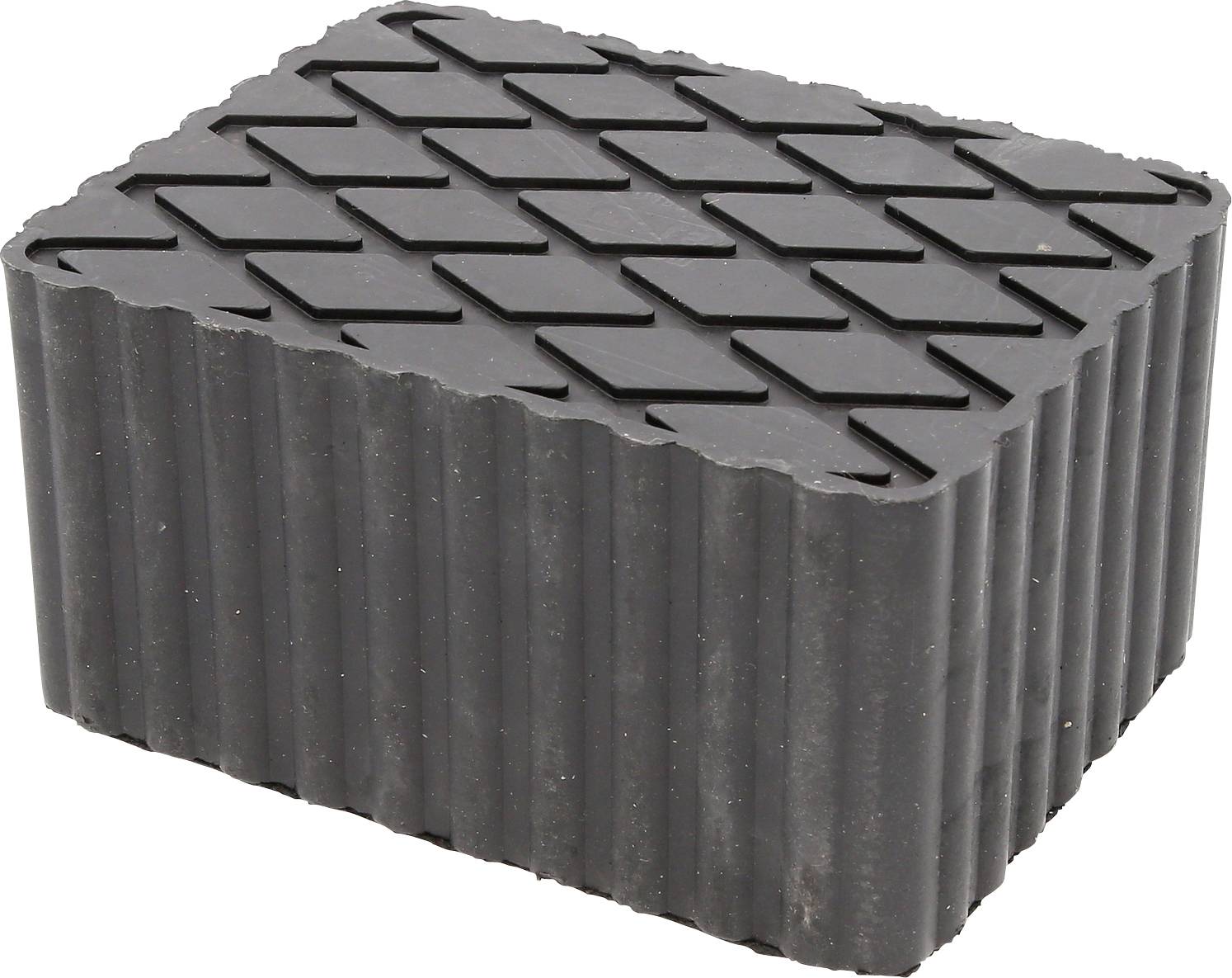 Ein rechteckiger, schwarzer Gummiblock mit rutschfestem Profilmuster oben. Verwendet zur Stabilisierung oder Dämpfung von Objekten.