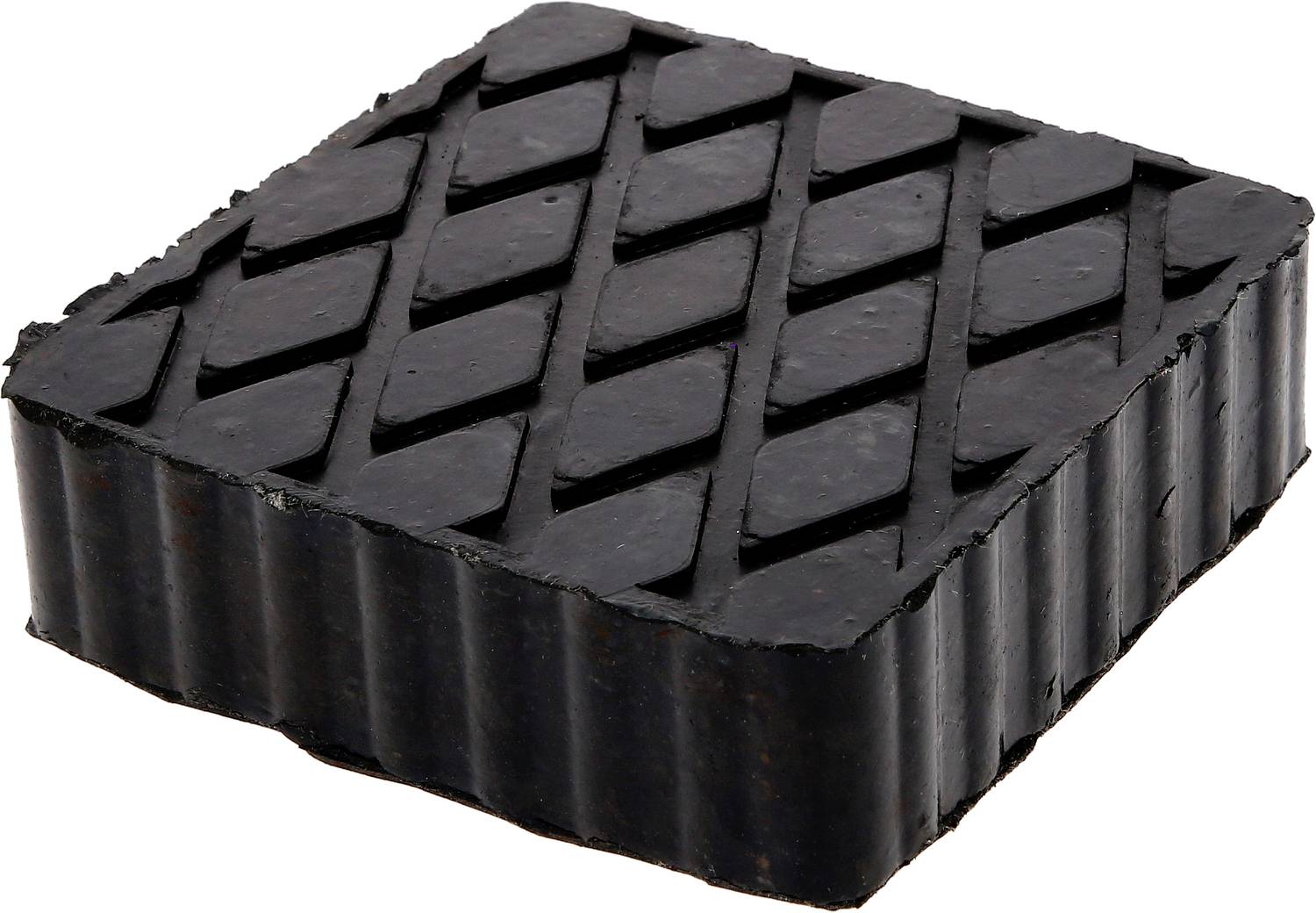 Ein schwarzer, quadratischer Gummiblock mit diagonalen Rillen auf der Oberfläche.