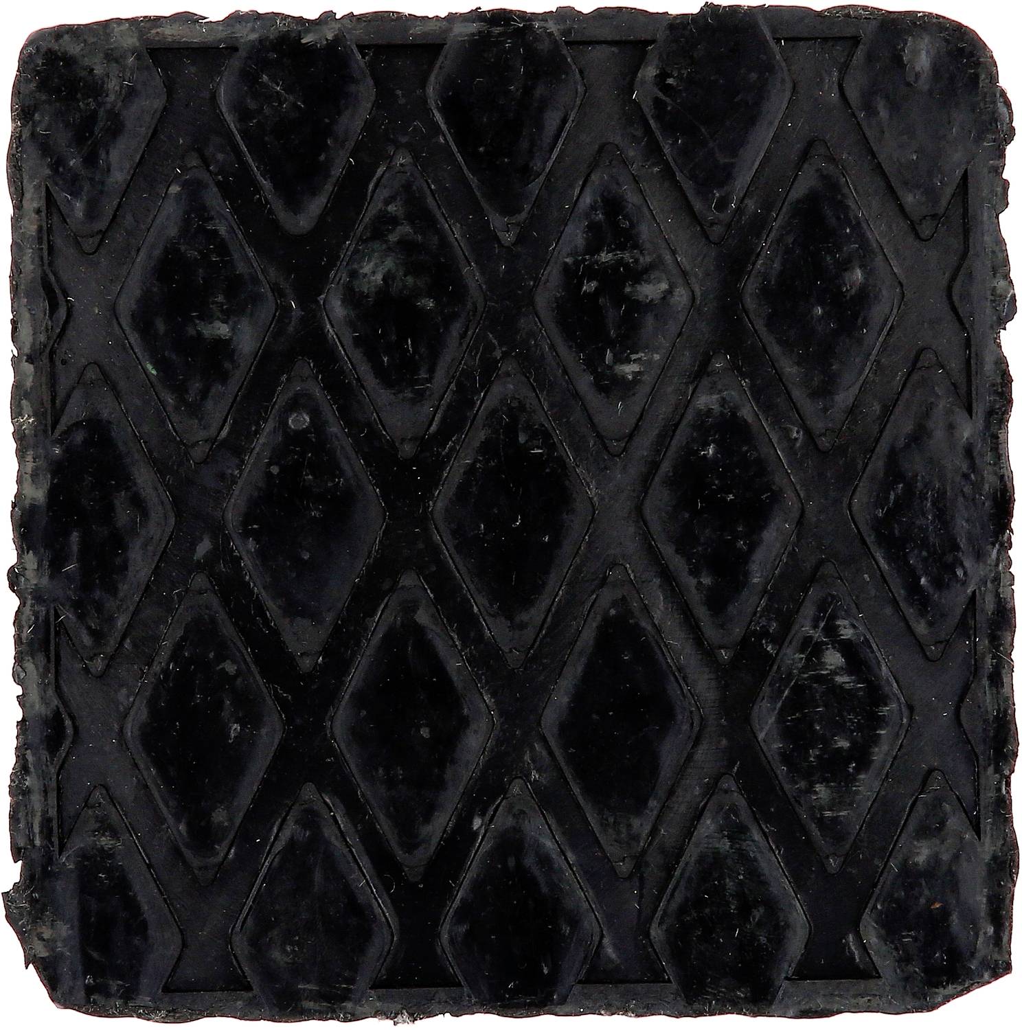 Dunkles Rechteck mit rautenförmigem Muster.