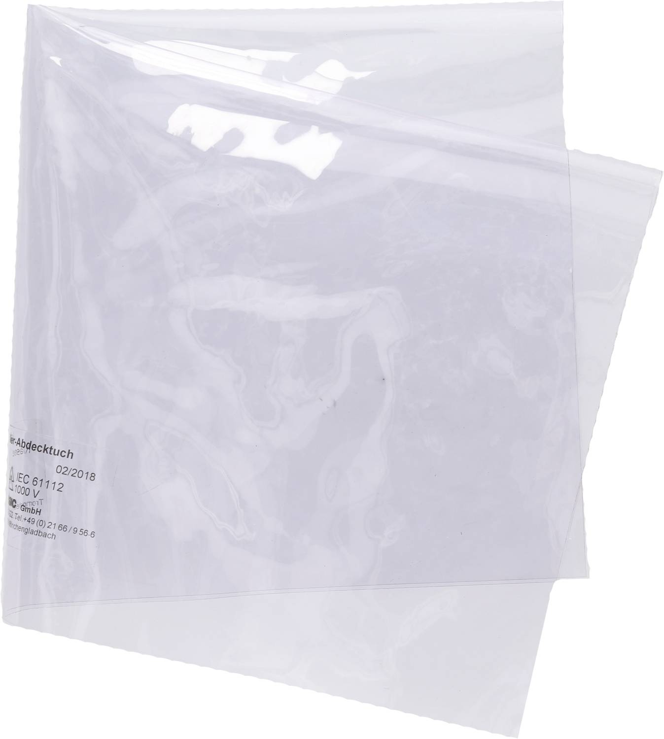 Ein durchsichtiges Plastik-Abdecktuch wird in einer Verpackung gezeigt. Das Tuch ist gefaltet und transparent.