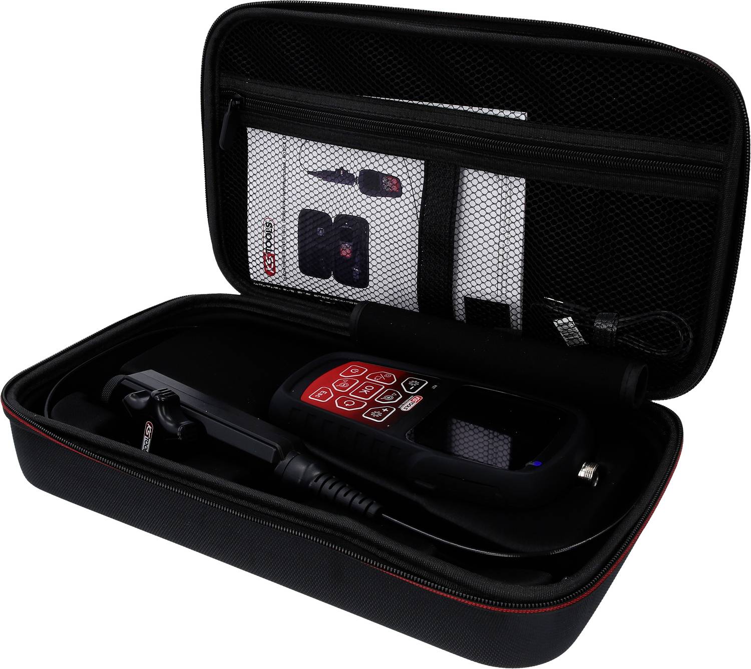 Ein offenes schwarzes Etui zeigt ein Inspektionskamera-Set mit Bildschirm, Anschlusskabeln und einer Bedienungsanleitung.