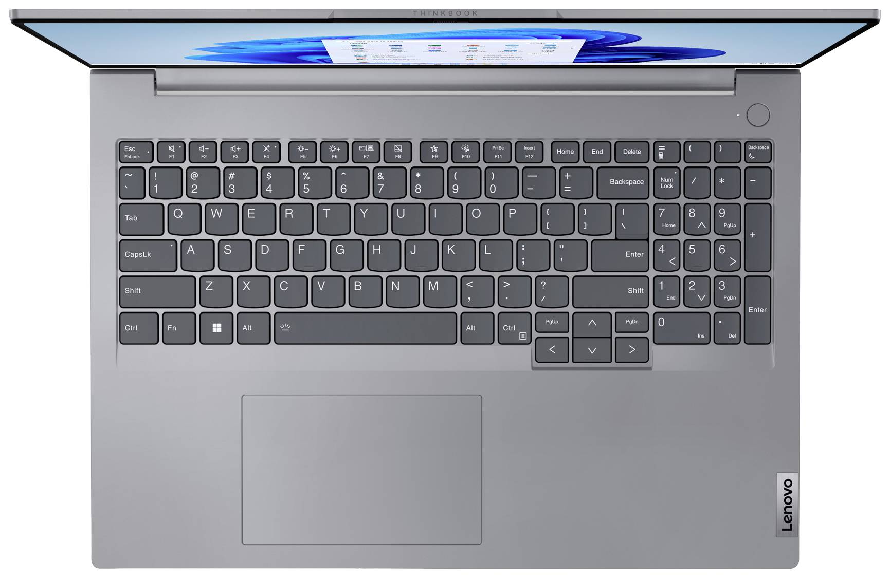 Ein silberner Laptop von oben, zeigt Tastatur mit deutschem Layout, beleuchtetem Bildschirm. Bildschirm zeigt Windows-Startmenü.