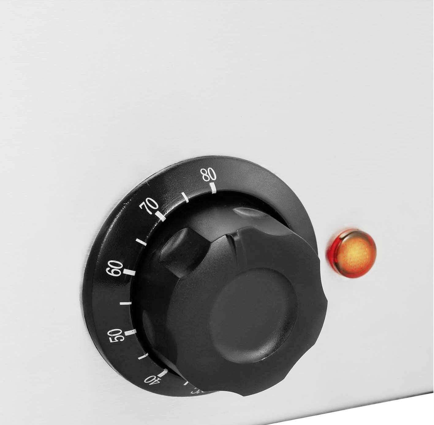 Ein Temperaturregler mit Skala von 60 bis 80 Grad und einem Drehknopf neben einer runden Kontrollleuchte.