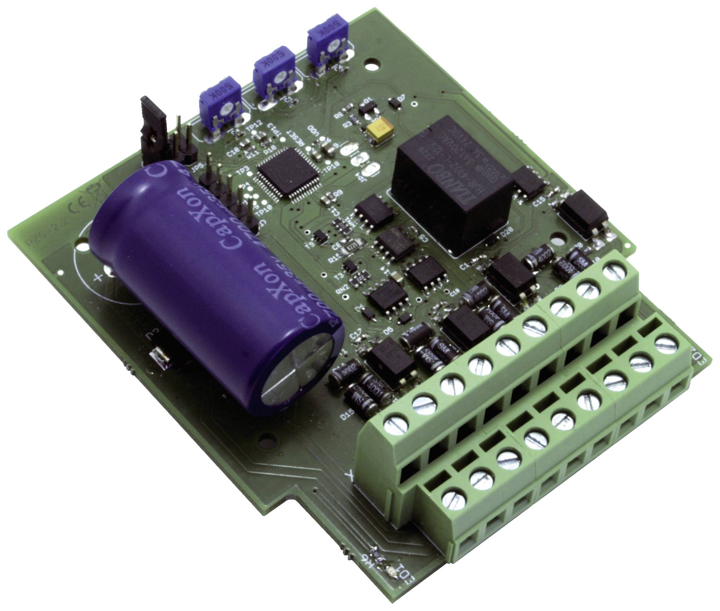 Eine grüne elektronische Leiterplatte mit blauen und schwarzen Komponenten, darunter ein großer zylindrischer Kondensator und mehrere Anschlüsse.