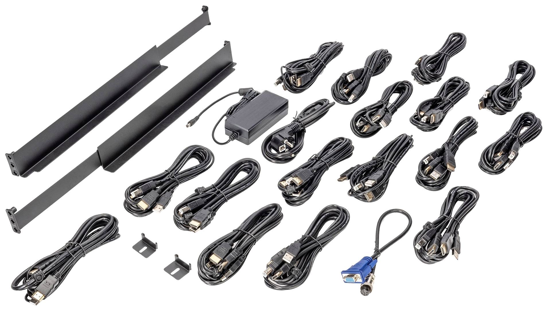 Satzungshalterungen und zahlreiche Kabel, einschließlich HDMI- und VGA-Kabel, auf einem Tisch ausgelegt. Ein Netzadapter ist ebenfalls enthalten.