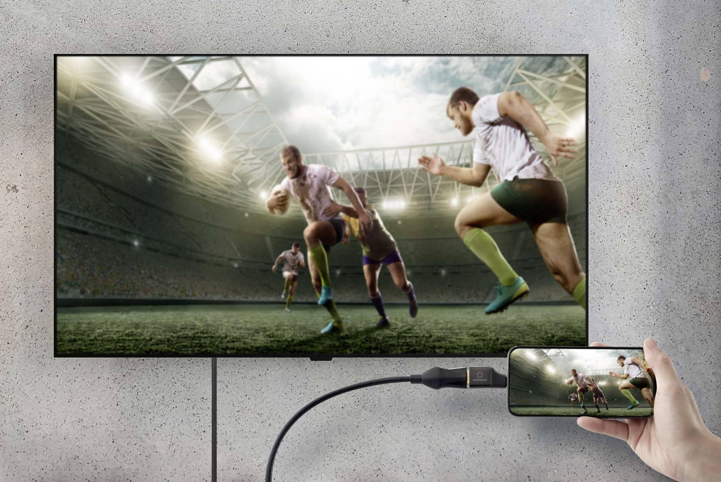 Ein TV-Bildschirm zeigt ein Rugby-Spiel, bei dem Spieler auf einem Feld laufen. Ein Smartphone wird per Kabel mit dem TV verbunden.