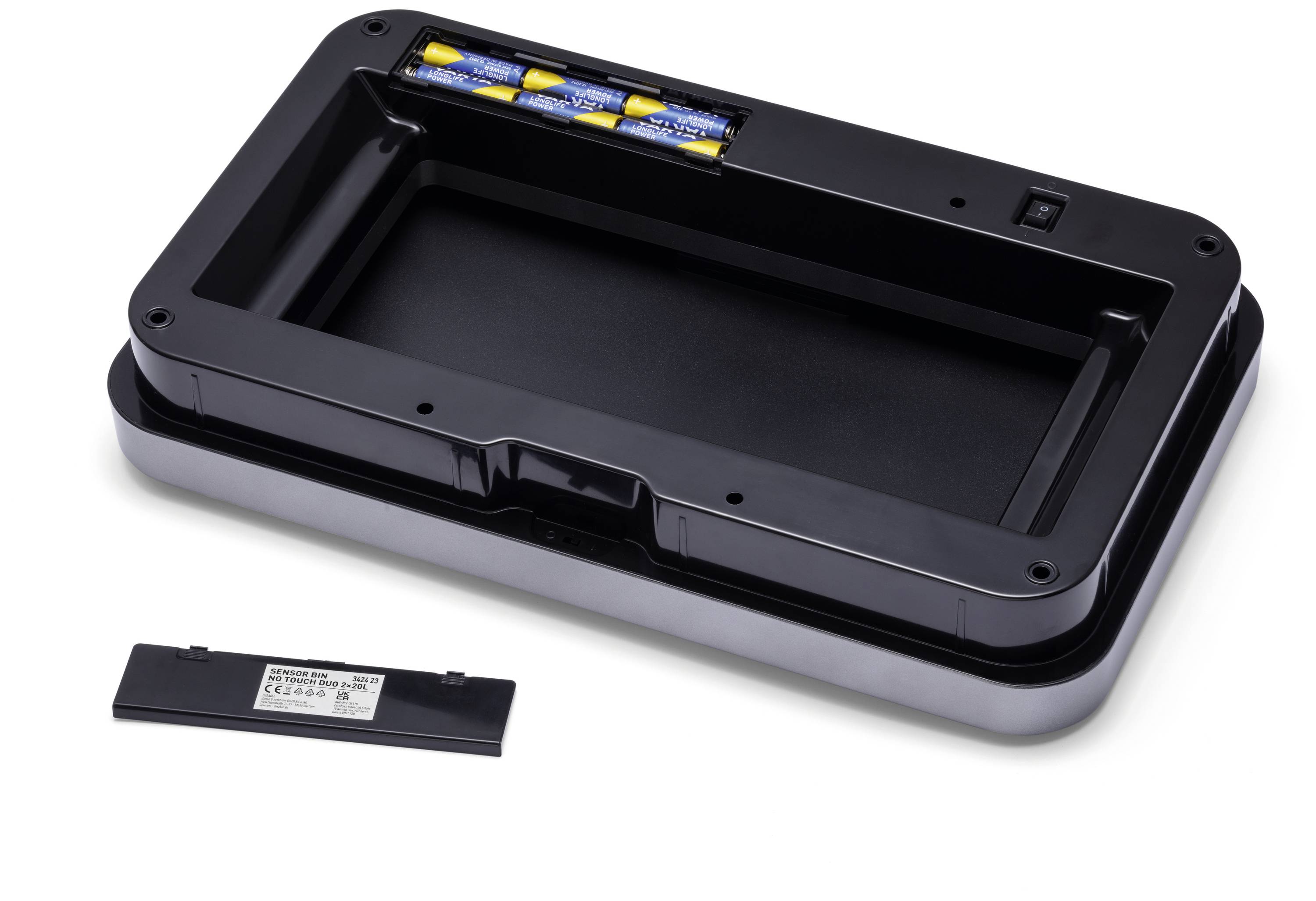 Plastikgehäuse mit Batteriefach und herausnehmbarer Abdeckung, zeigt vier eingelegte AA-Batterien.