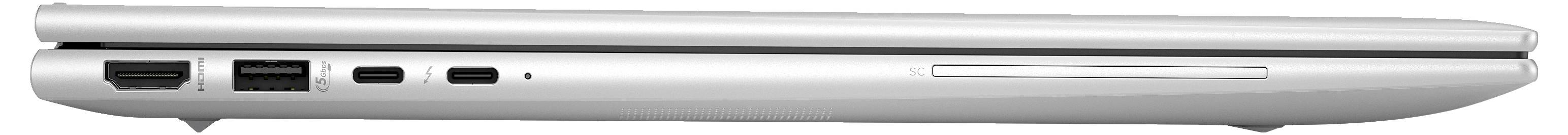 Ein dünner, geschlossener Laptop in silberner Farbe, seitlich gezeigt. Zu sehen sind diverse Anschlüsse wie USB- und HDMI-Ports auf der linken Seite.