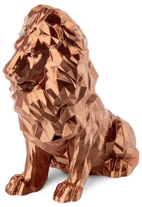 Eine kleine, geometrisch geformte Löwenfigur aus glänzendem, kupferfarbenem Material.