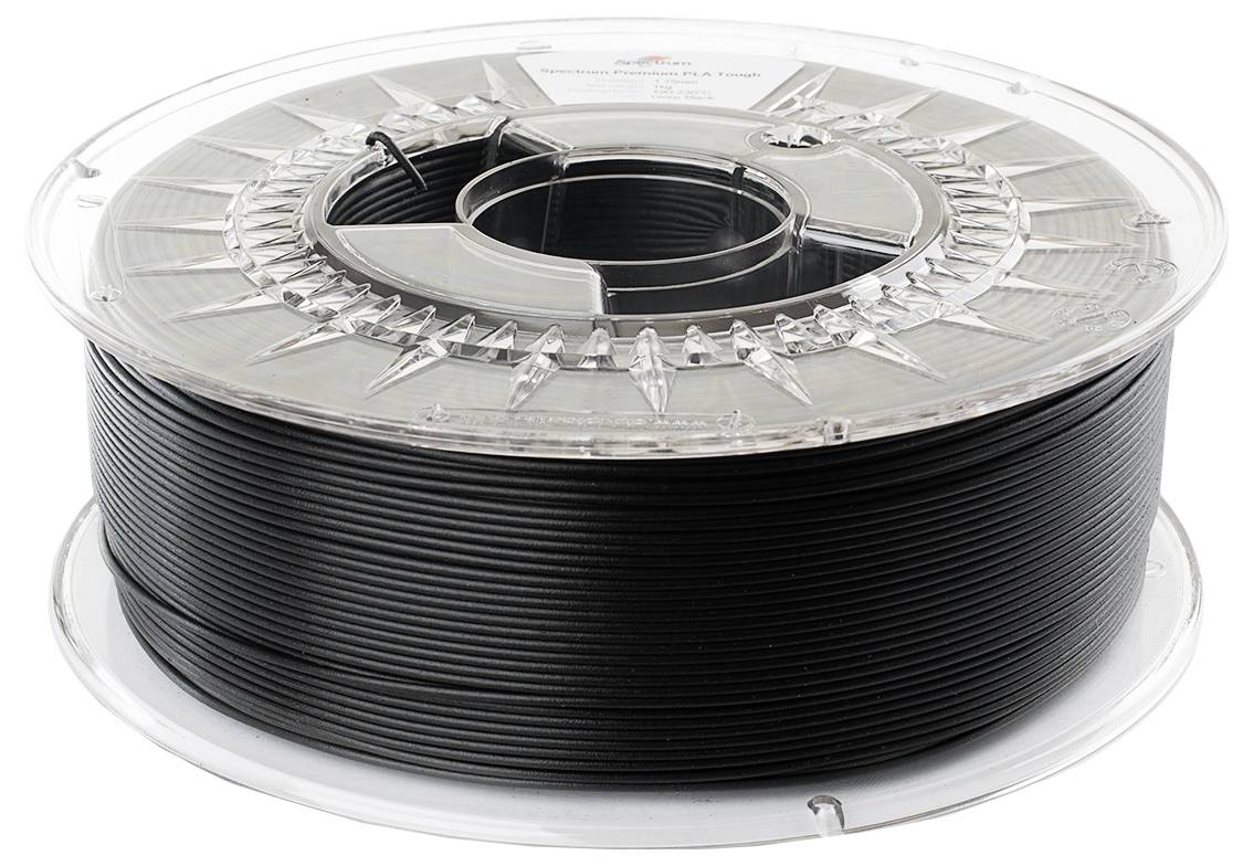 Eine Spule mit schwarzem 3D-Druckerfilament aus Kunststoff in transparenter Verpackung.