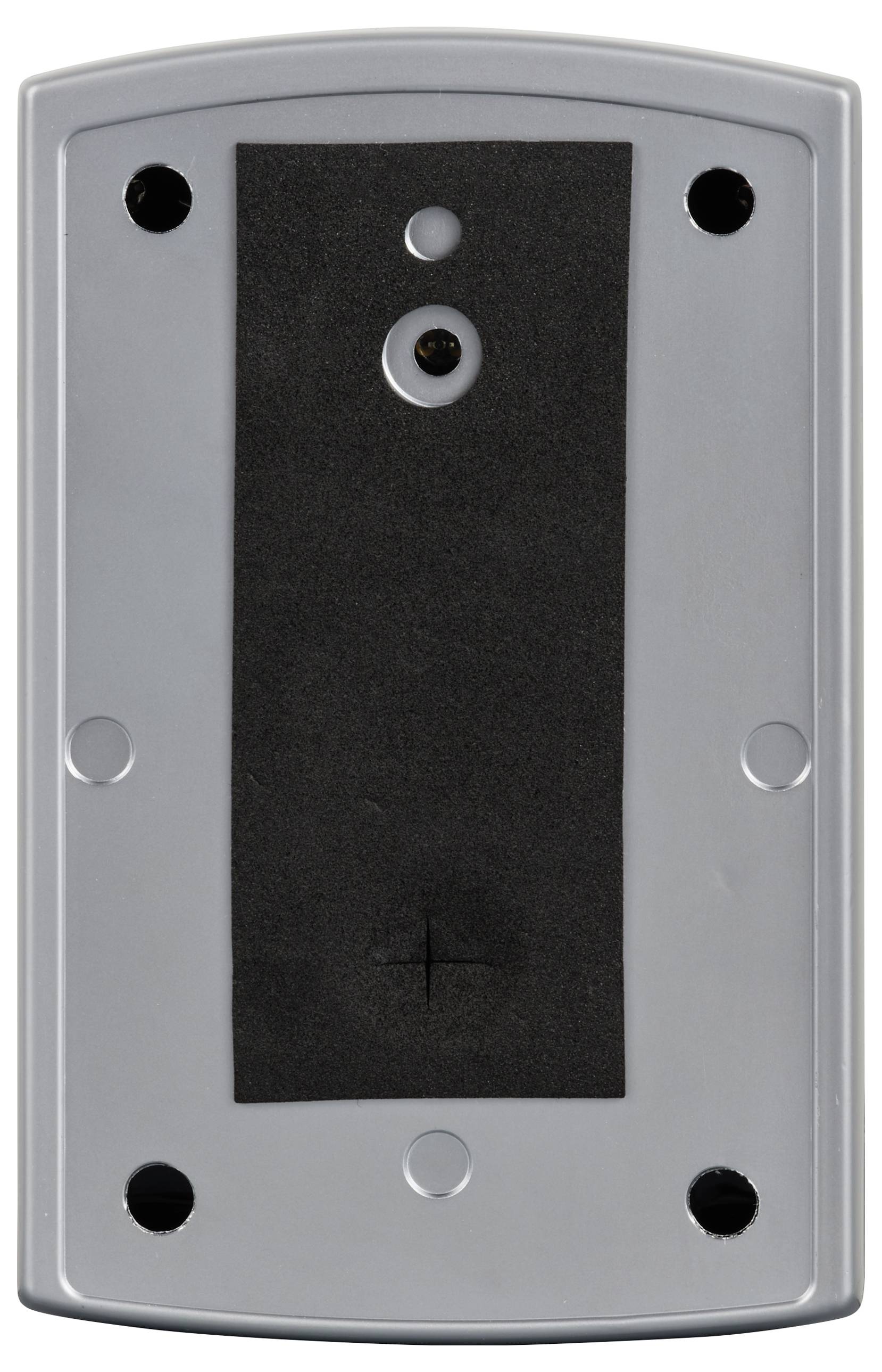 Ein rechteckiges, graues Gerät mit sechs runden Aussparungen an den Ecken und Zentren, Kabelanschluss oben und Kreuzsymbol unten.