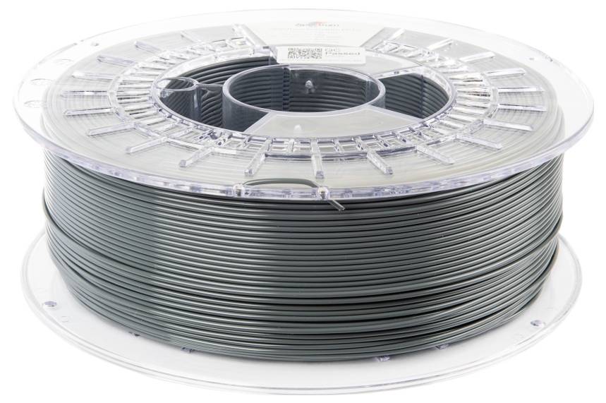 Eine Spule mit dunkelgrauem Filament, geeignet für 3D-Drucker, liegt auf einem Tisch. Die Spule ist durchsichtig und enthält ein Etikett.