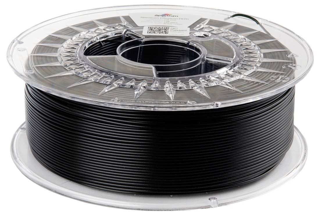 Schwarze Filamentspule für 3D-Drucker in transparenter Kunststoffverpackung.