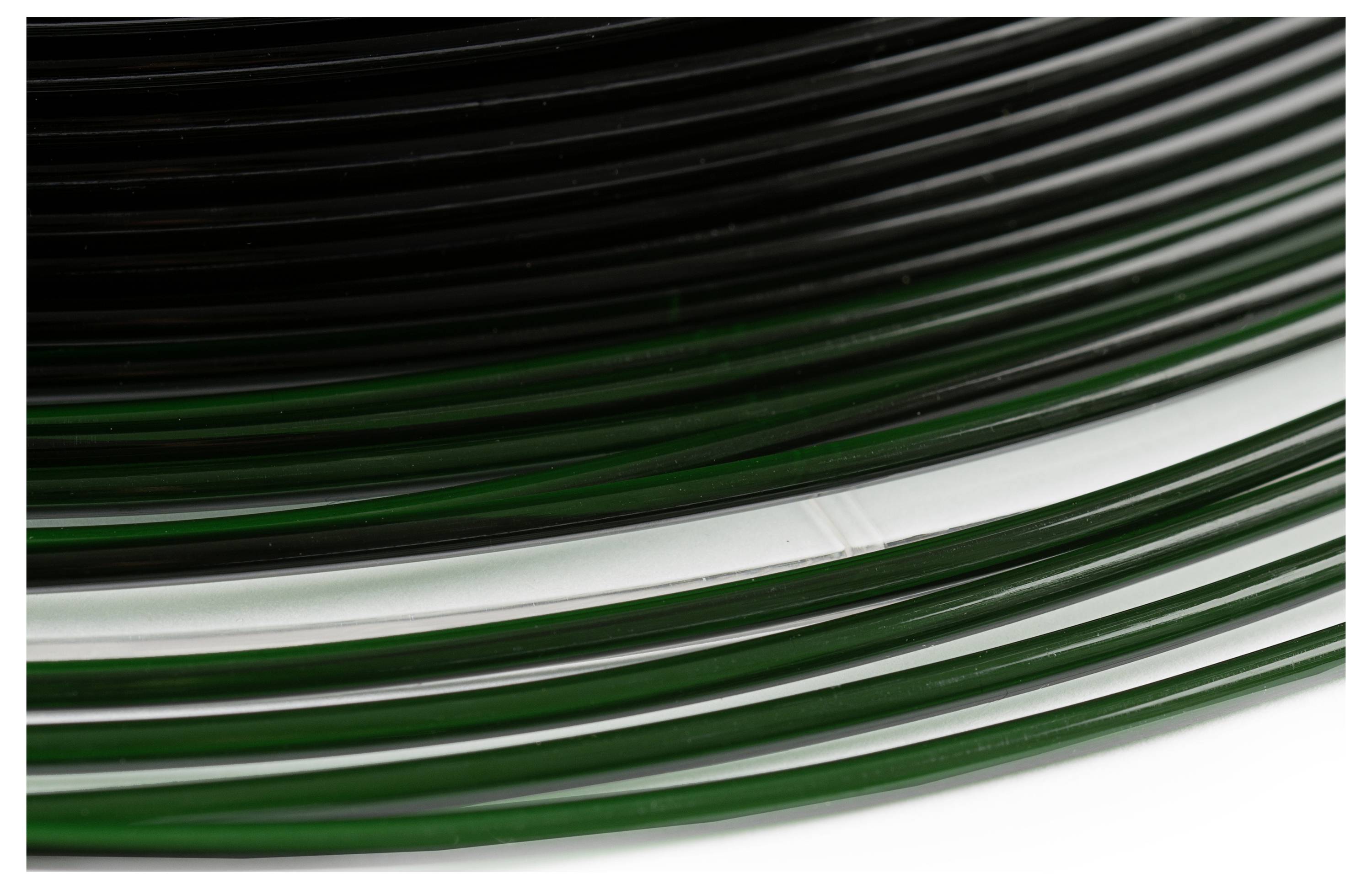 Mehrere grüne und schwarze Kunststoffdrähte liegen übereinander geschichtet.