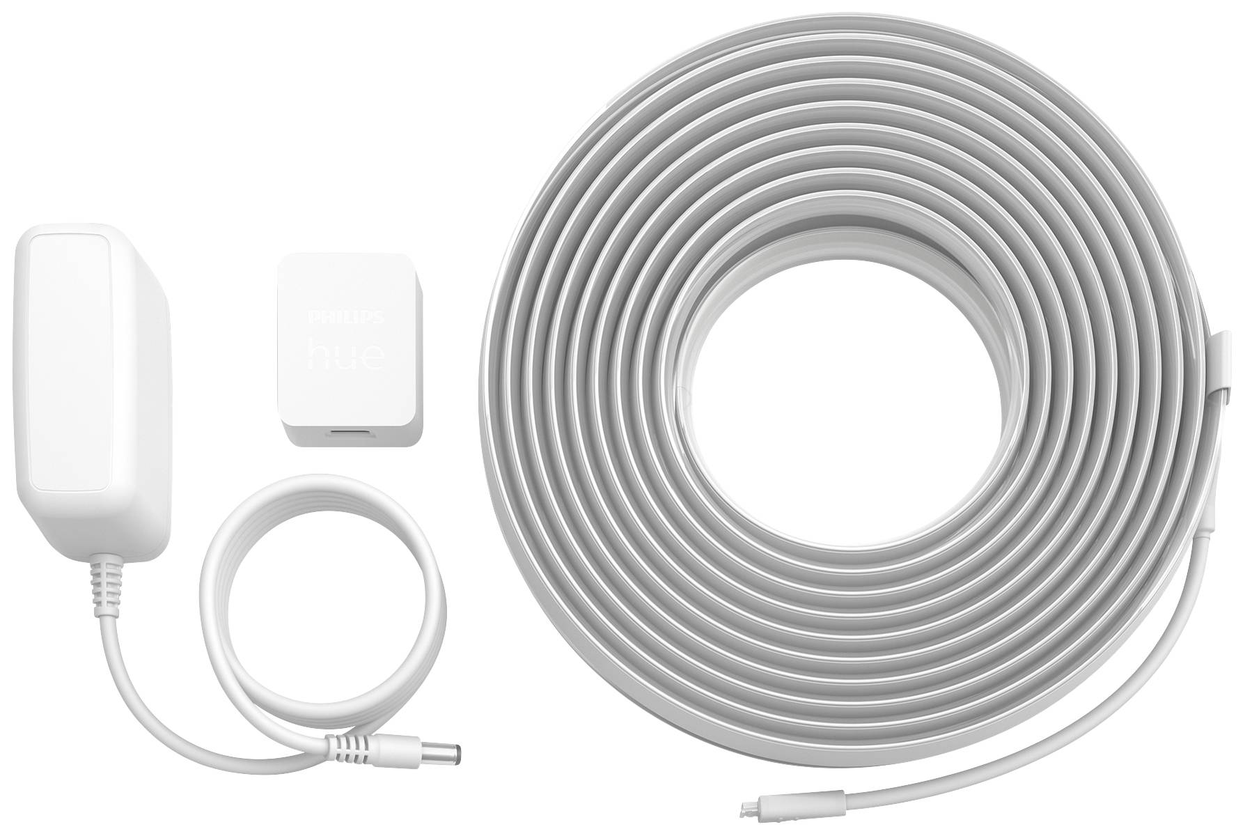 Netzteil, Adapter und aufgerolltes Lichtband, möglicherweise Philips Hue Erweiterung, auf weißem Hintergrund.