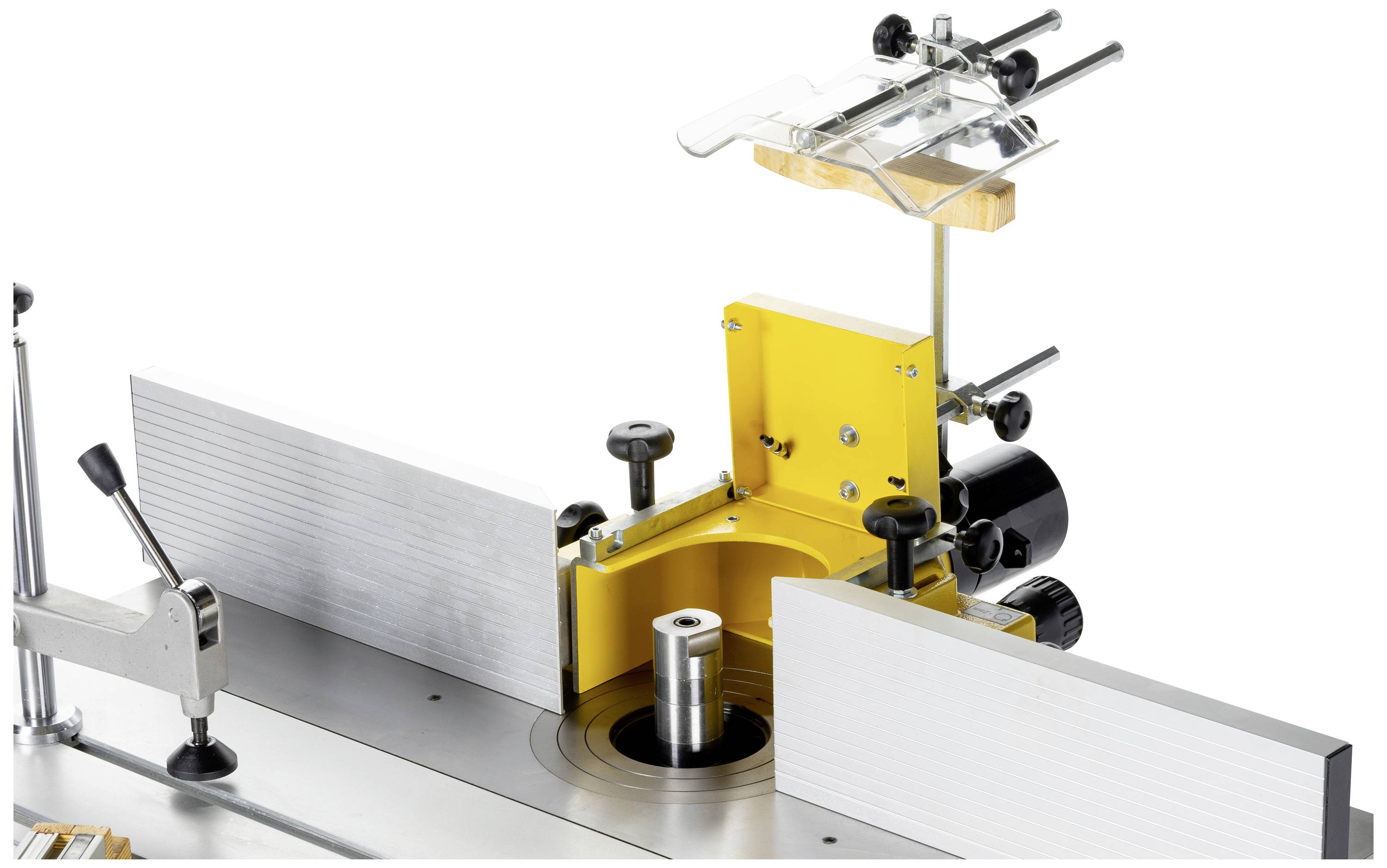 Gelbe Fräsmaschine mit silbernen Führungsschienen und schwarzem Einstellrad, auf einer Tischoberfläche montiert.