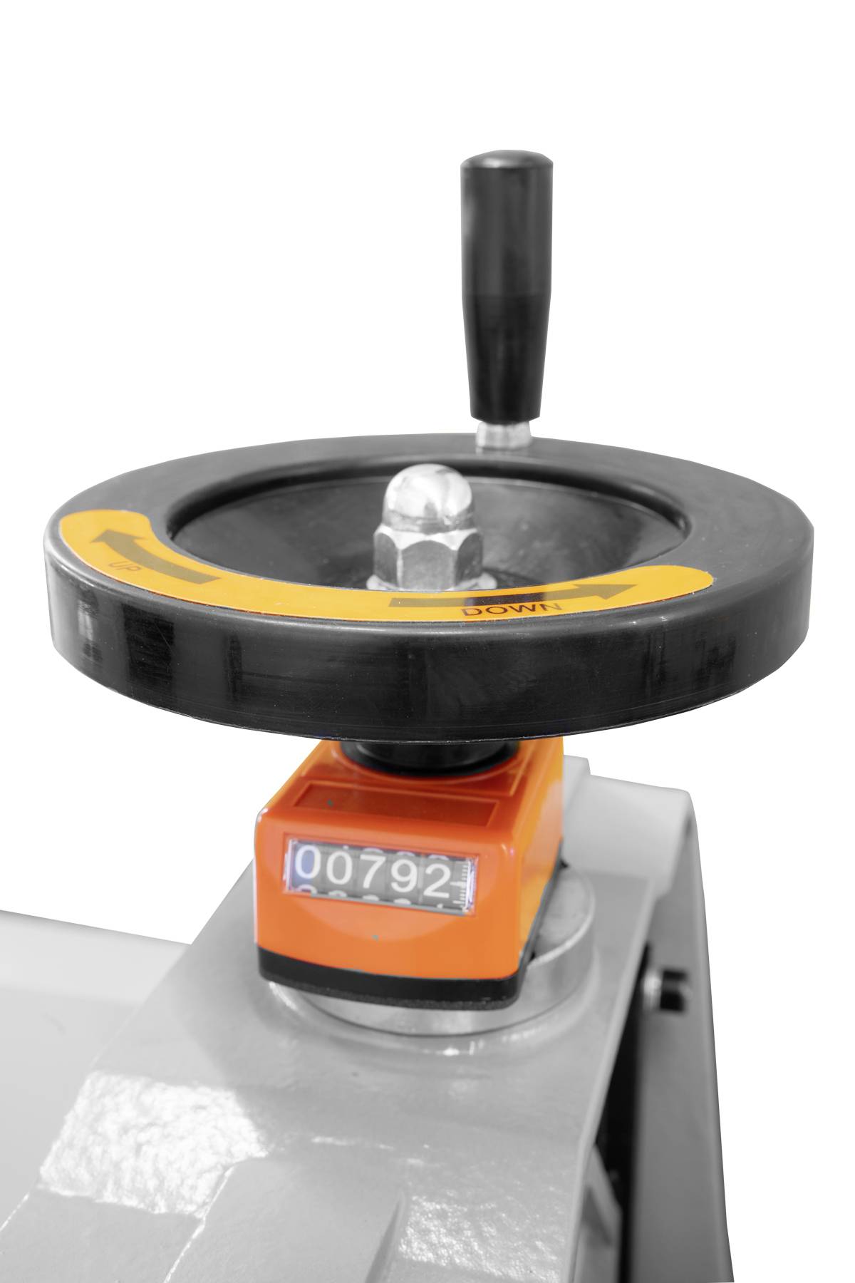 Ein Zählwerk mit der Anzeige '00792' ist an einer Maschine angebracht. Über dem Zählwerk ist ein schwarzer Drehgriff sichtbar.