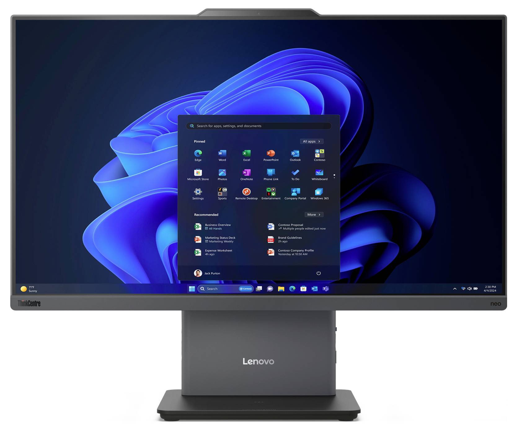 Ein Monitor zeigt einen Computerbildschirm mit Windows 11 Benutzeroberfläche. Das Startmenü ist geöffnet, Programme sind sichtbar.