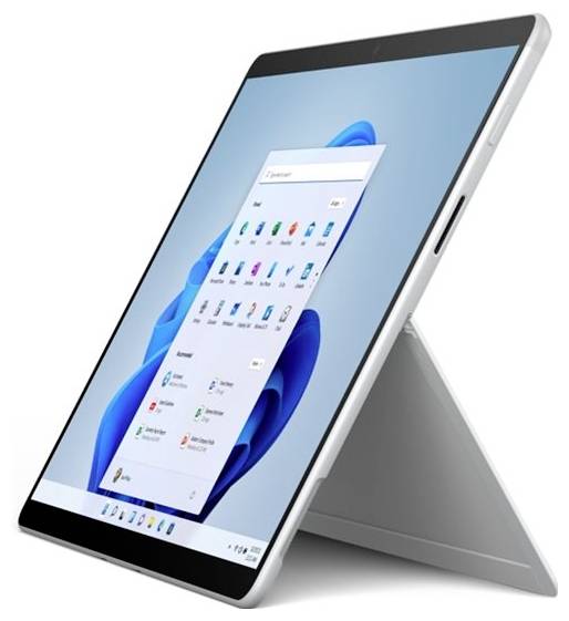Ein Tablet mit Kickstand zeigt den Windows-Startbildschirm mit verschiedenen App-Symbolen auf einem blauen Hintergrund.