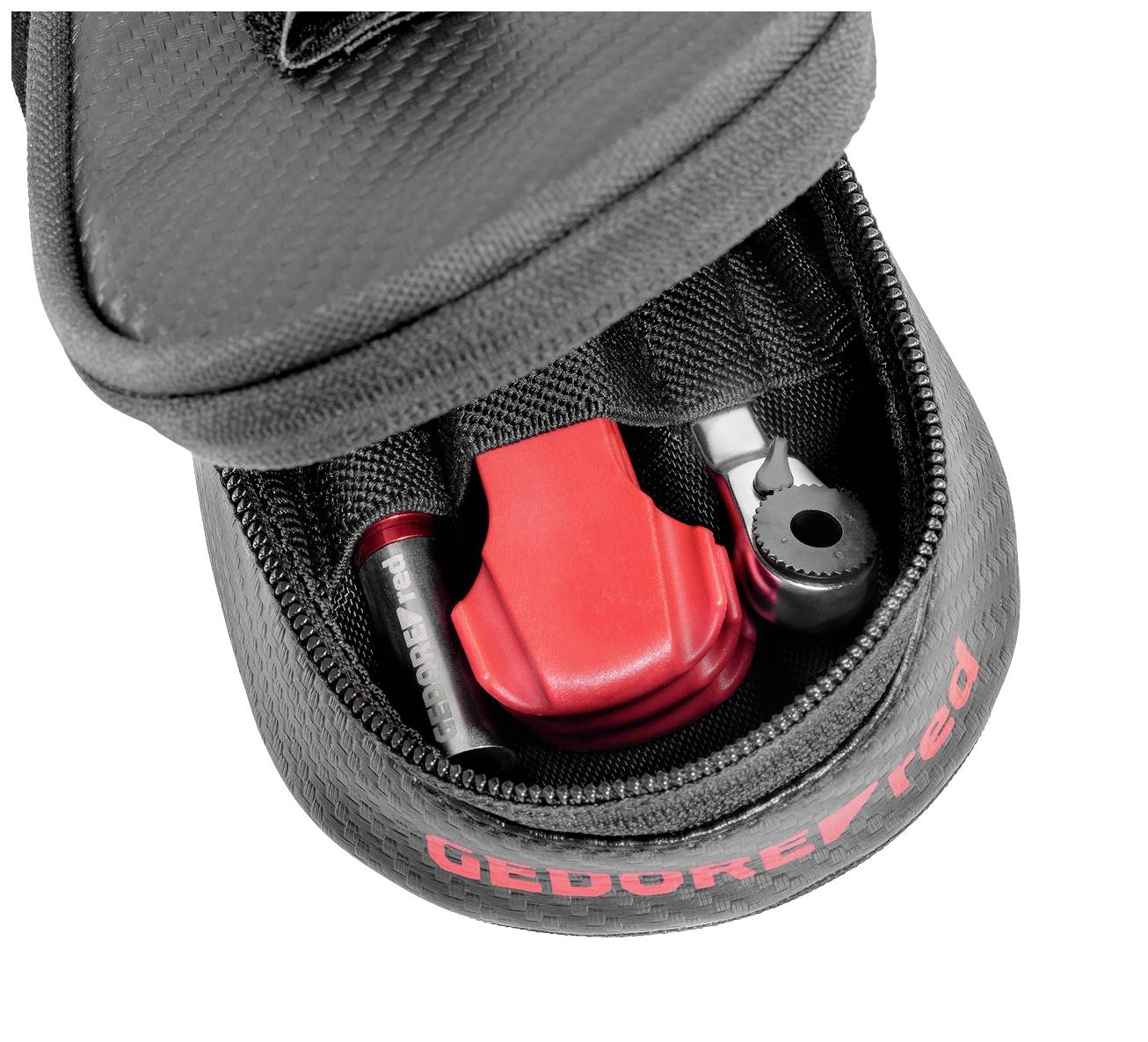 Ein geöffnetes schwarzes Etui zeigt verschiedene Werkzeuge, darunter einen roten Drehmomentschlüssel und Bits.