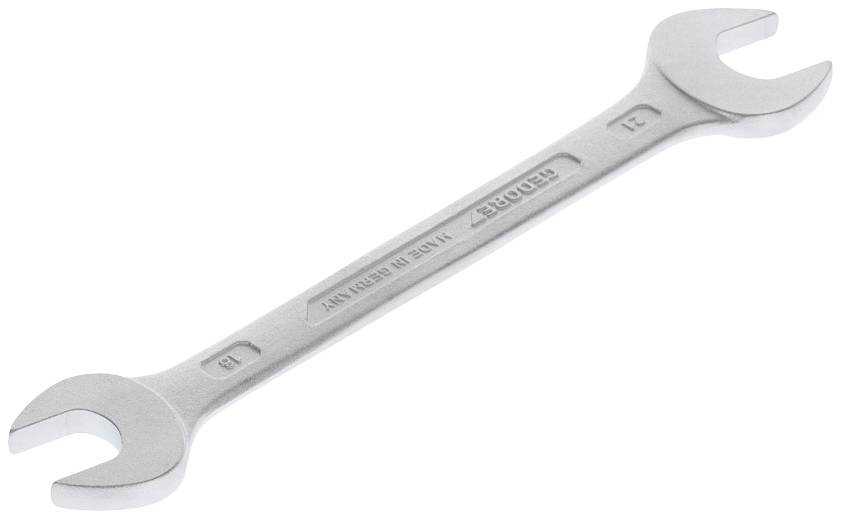 Ein silberner Doppelmaulschlüssel mit den Größen 21 und 23 mm auf einem weißen Hintergrund.