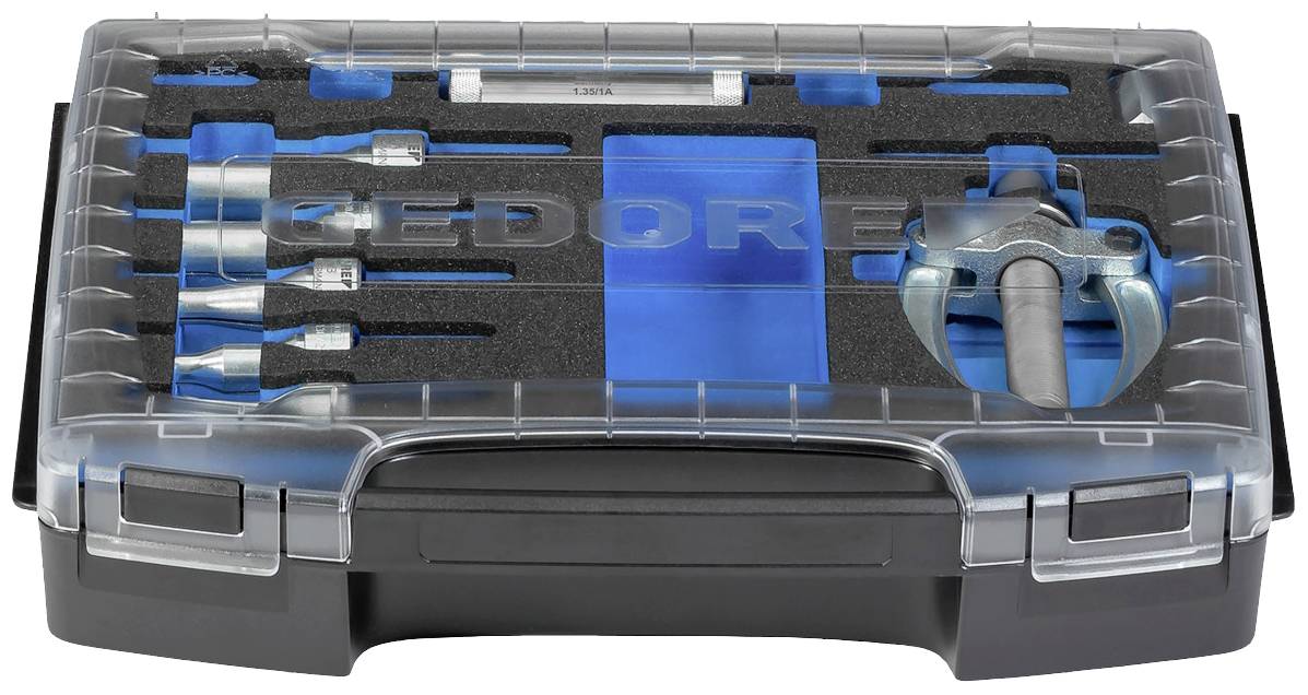 Werkzeugkoffer mit verschiedenen Werkzeugen, darunter Schraubendreher und ein Hammer. Markenname auf dem Deckel eingeprägt.