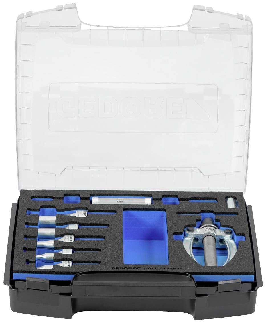 Ein Werkzeugkoffer mit verschiedenen Steckschlüsselsätzen und einem blauen Fach, geordnet in einer schwarzen Schaumstoffeinlage.