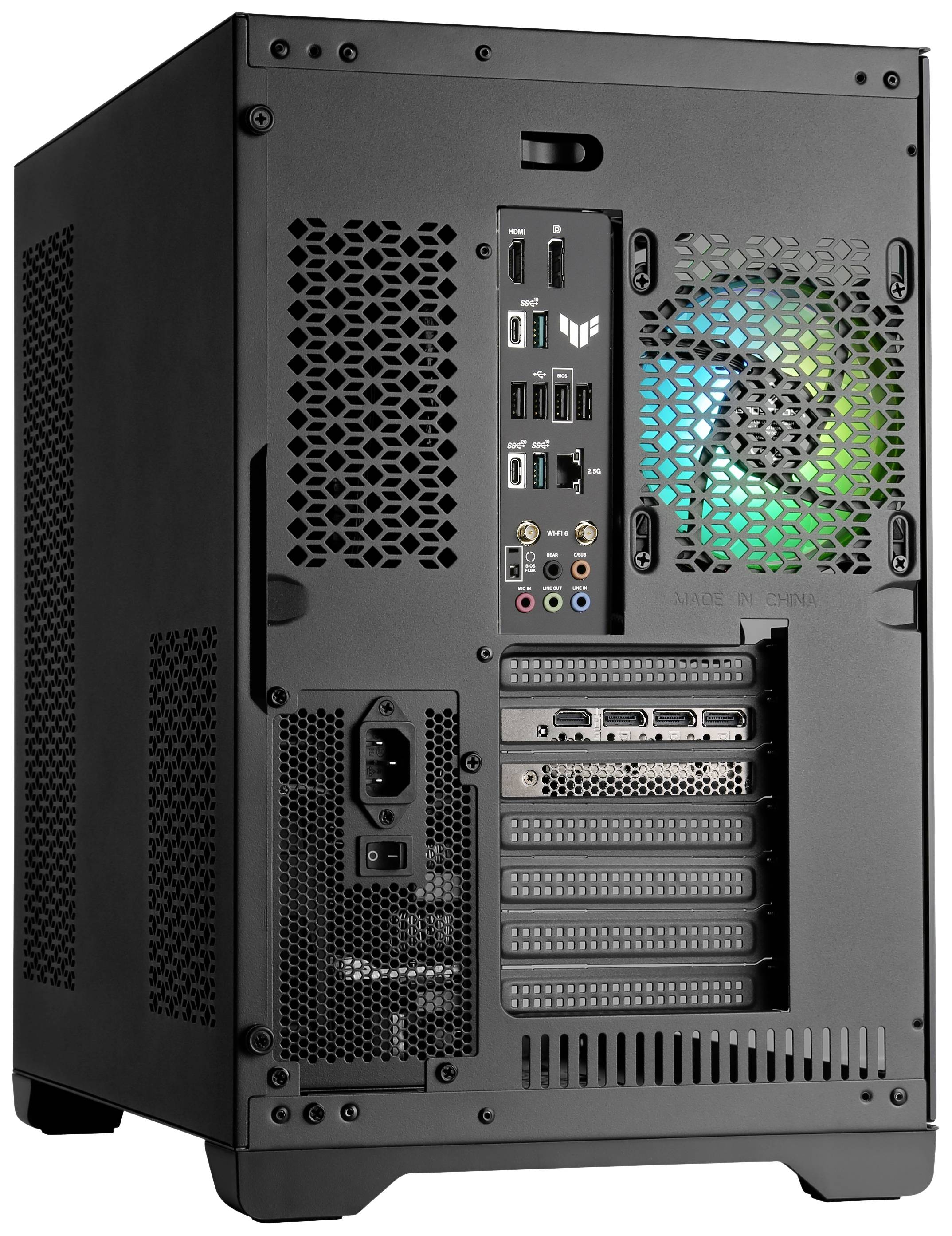 Ein geöffneter Computer mit sichtbarem Innenleben. Ein Lüfter leuchtet in Blau-Grün. Verschiedene Anschlüsse und Steckplätze hinten sichtbar.