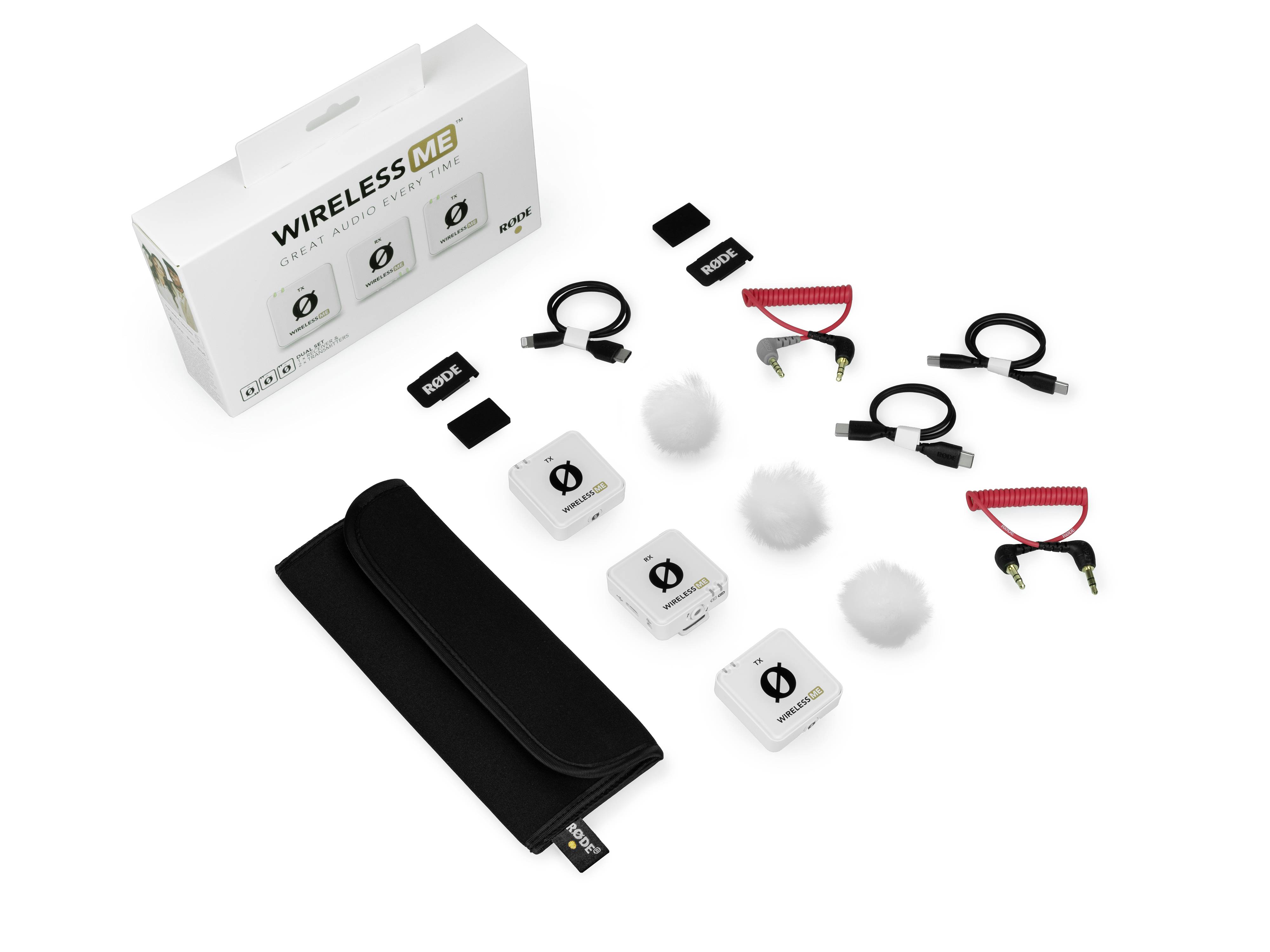Kabelloses Mikrofon-Set mit Empfängern, Mikrofonen, Windschutz, Kabeln und Zubehör, verpackt in einer weißen Box mit der Aufschrift 'Wireless Me'.
