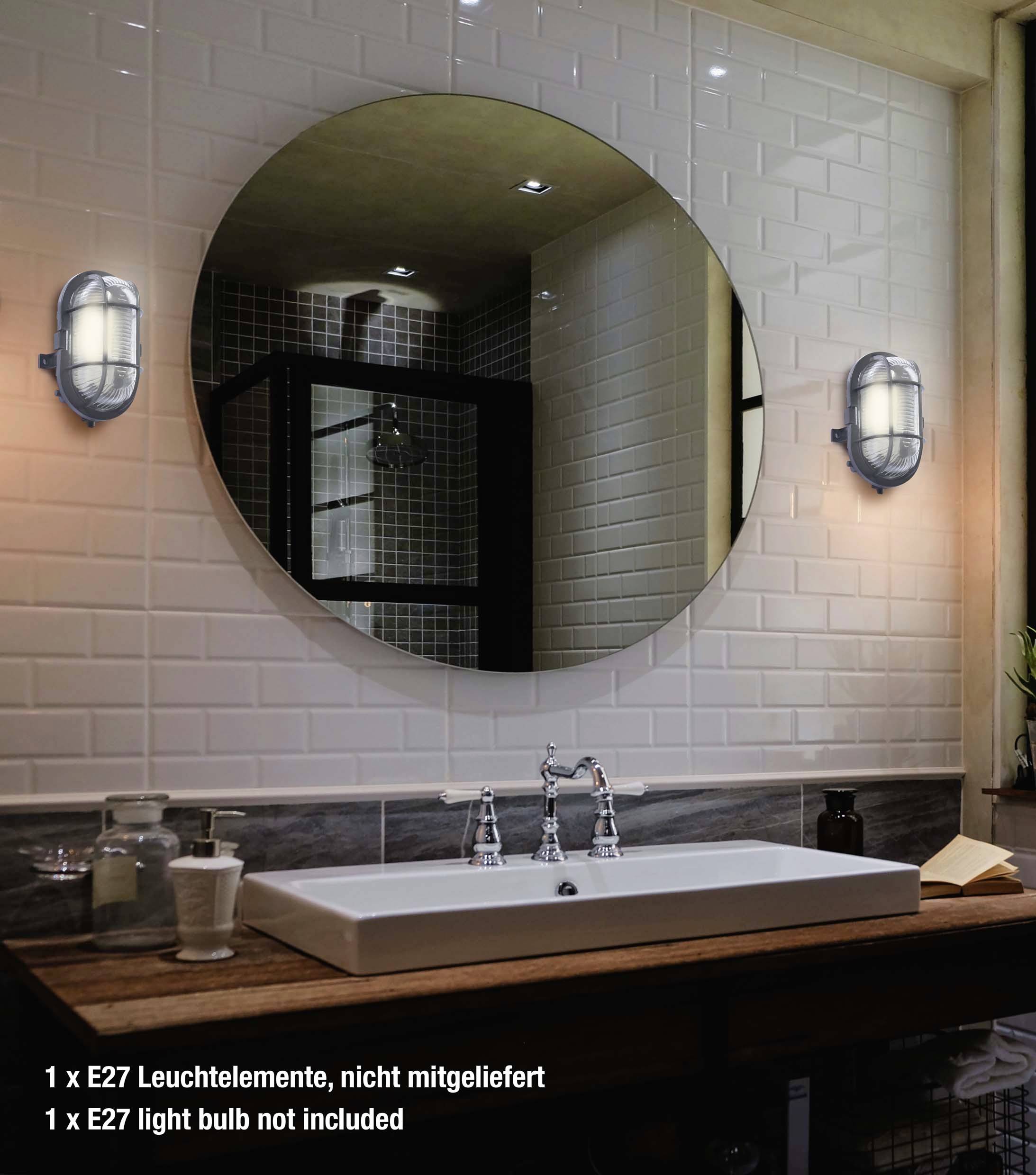 Runder Spiegel über einem Waschbecken, flankiert von zwei Wandlampen. Unter dem Waschbecken steht '1 x E27 Leuchtelemente, nicht mitgeliefert'.