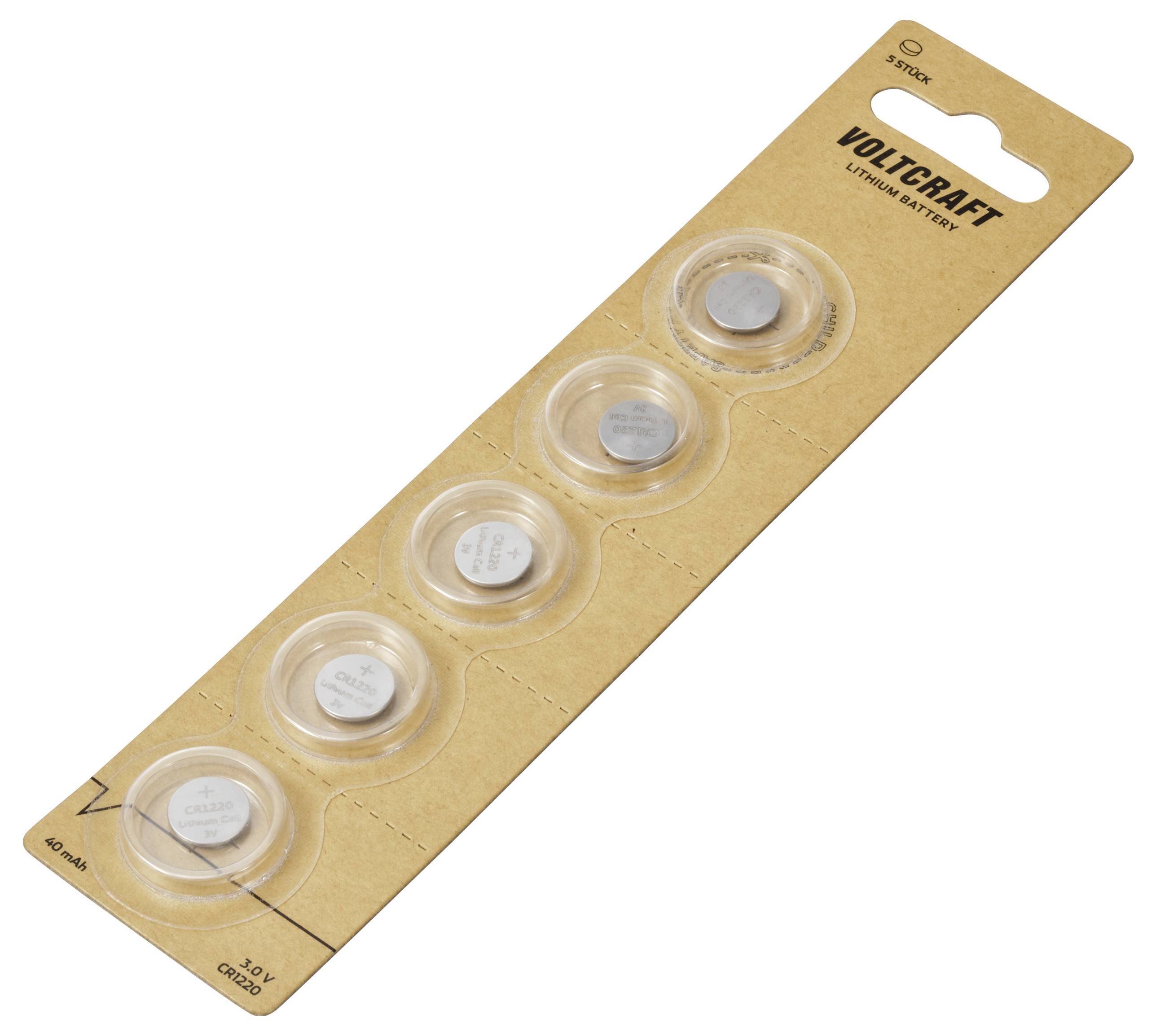 Eine Blisterverpackung mit fünf Lithium-Knopfzellenbatterien der Marke Voltcraft, Modell CR2032, auf braunem Karton.