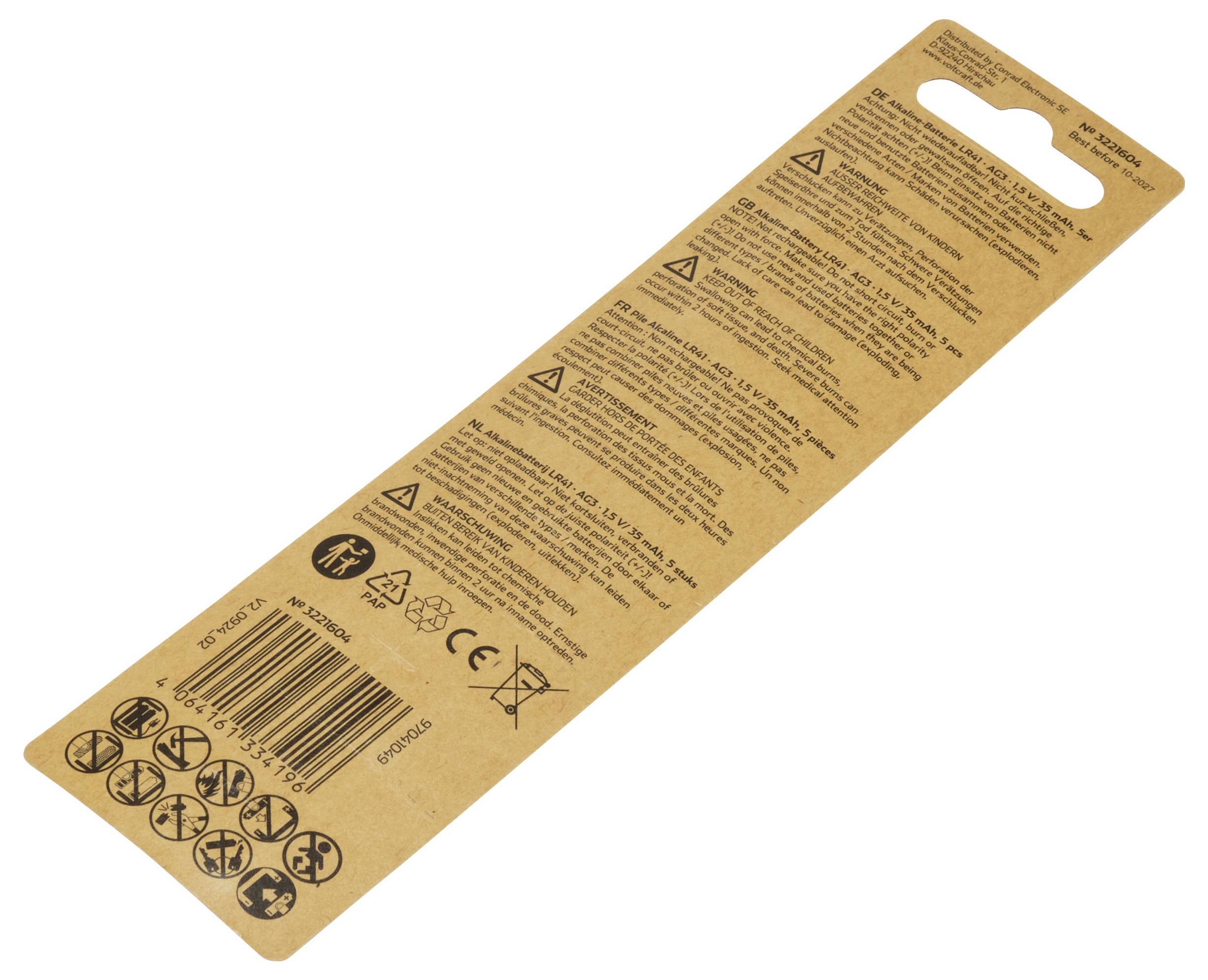 Verpackungsrückseite eines Schraubendrehersets. Enthält Sicherheitssymbole und Warnhinweise in mehreren Sprachen auf braunem Karton.