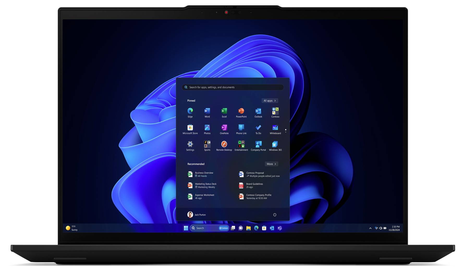 Ein geöffneter Laptop-Bildschirm zeigt das Startmenü von Windows 11, mit Apps und Suchleiste auf blauem Hintergrund.