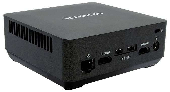 Ein schwarzer Mini-PC mit HDMI-, USB- und Ethernet-Anschlüssen, Markenname oben. Kompakt und vielseitig einsetzbar.