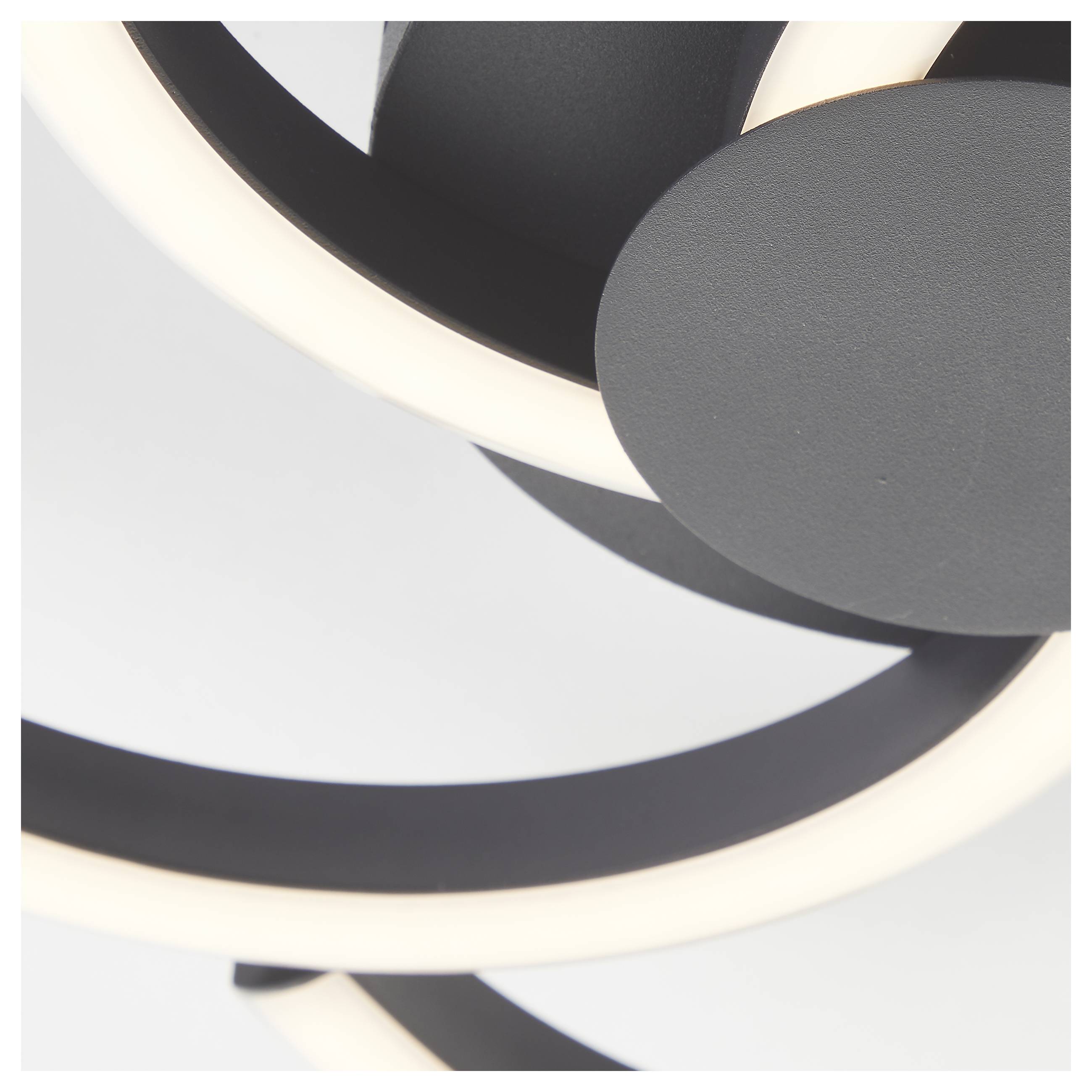 Moderne Deckenleuchte mit kreisförmigem Design und leuchtenden Ringen in Schwarz und Weiß.