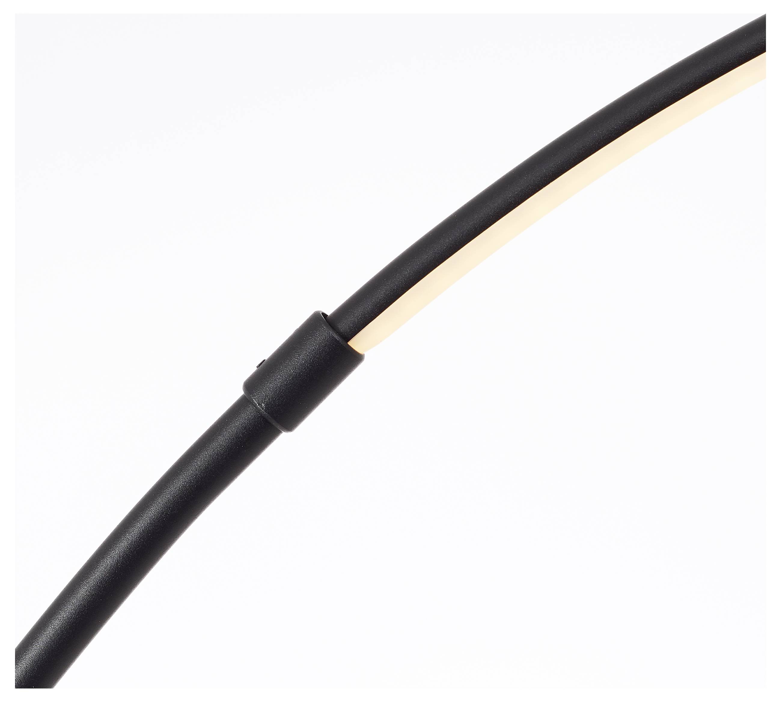 Ein schwarzes Kabel mit einer goldfarbenen Litze in Nahaufnahme.