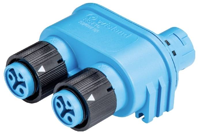 Ein blauer elektrischer Steckverbinder mit zwei schwarzen, zylindrischen Anschlüssen. Geeignet für sichere elektrische Verbindungen.